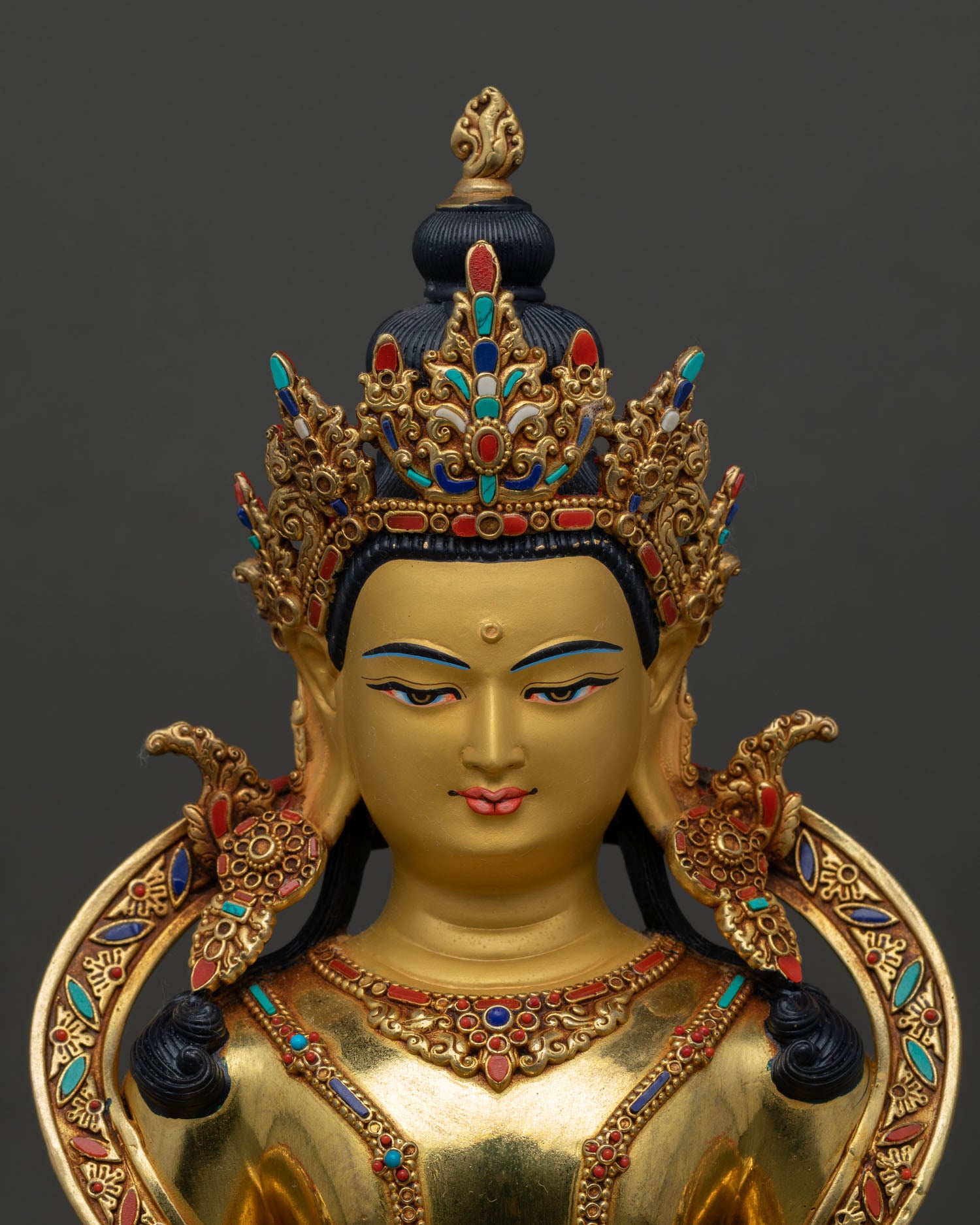 Amitayus face close up gold painted expression turquoise coral inlays detailed halo sacred Himalayan craftsmanship