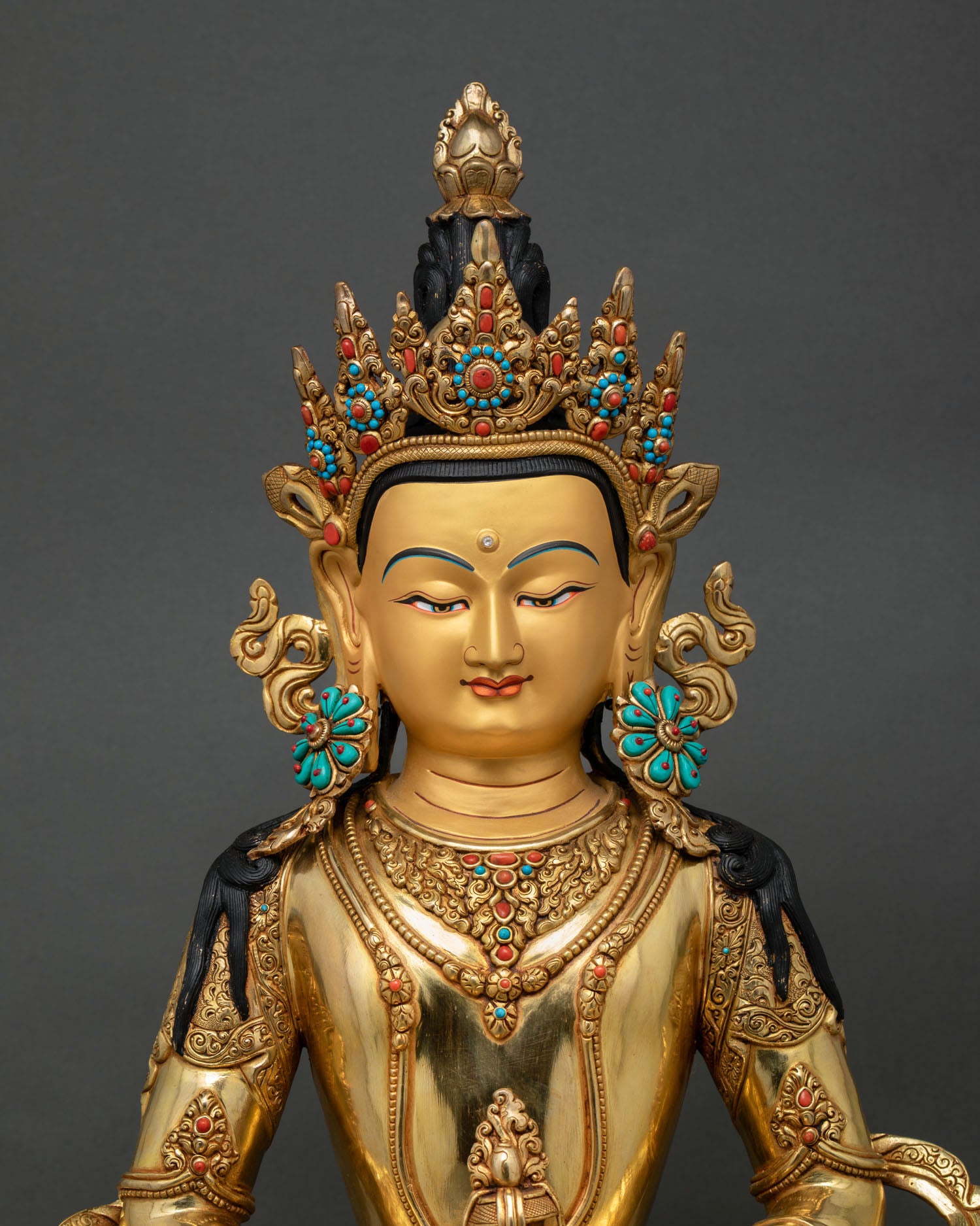 Amitayus statue close up view, gold gilded copper details Himalayan craftsmanship Nepal