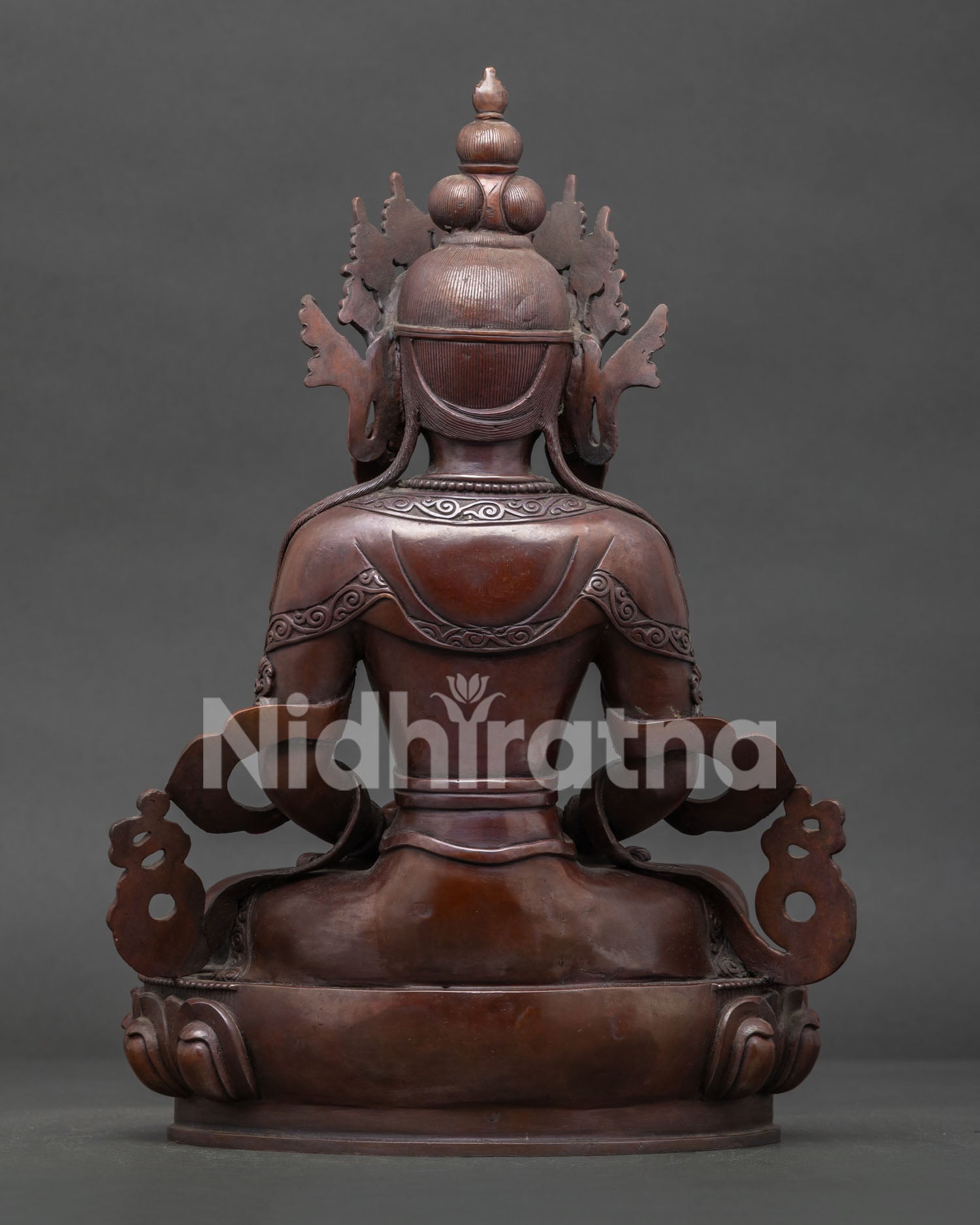 Amitayus statue detailed view showing sacred vase lotus throne and traditional Buddhist artistry.
