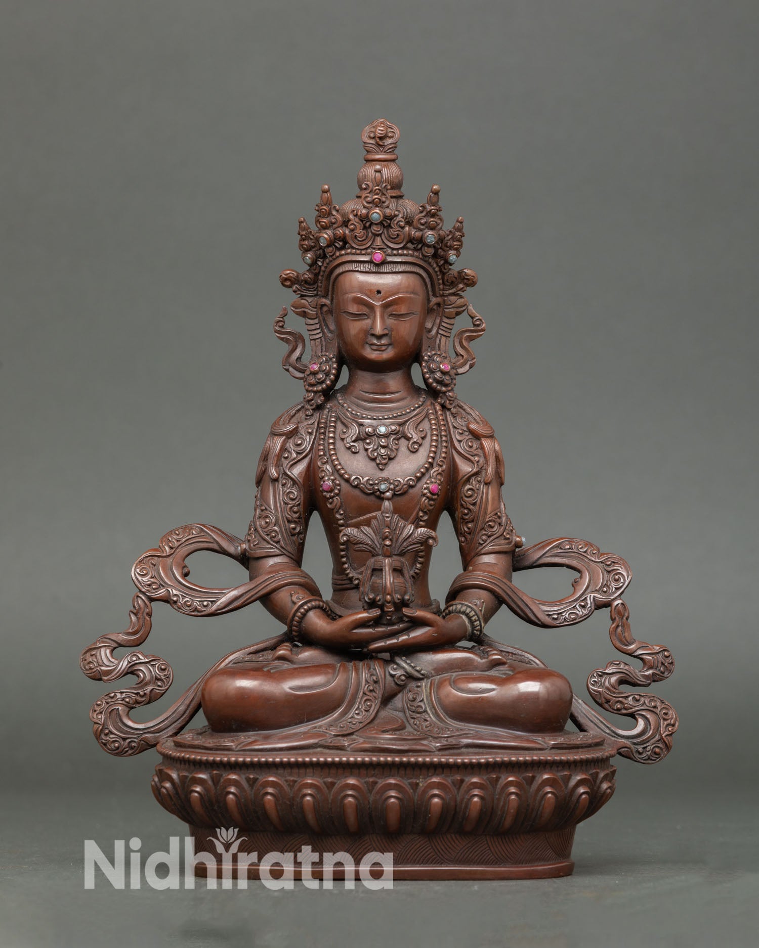 Amitayus statue handcrafted in Nepal oxidized copper, Buddha of infinite life, seated on lotus pedestal holding vase of immortal nectar