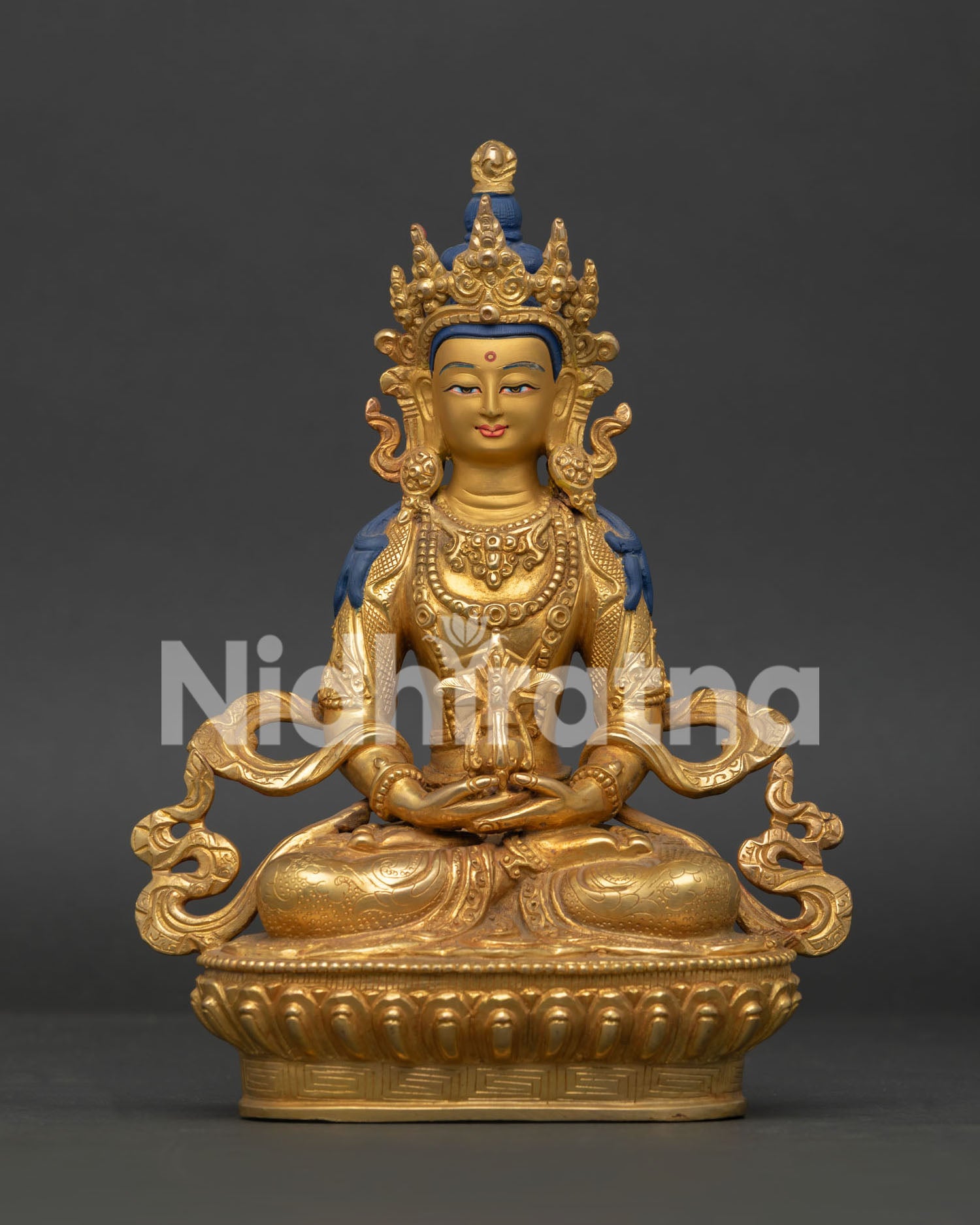 Amitayus statue handmade in Nepal with gold fire gilded copper body.