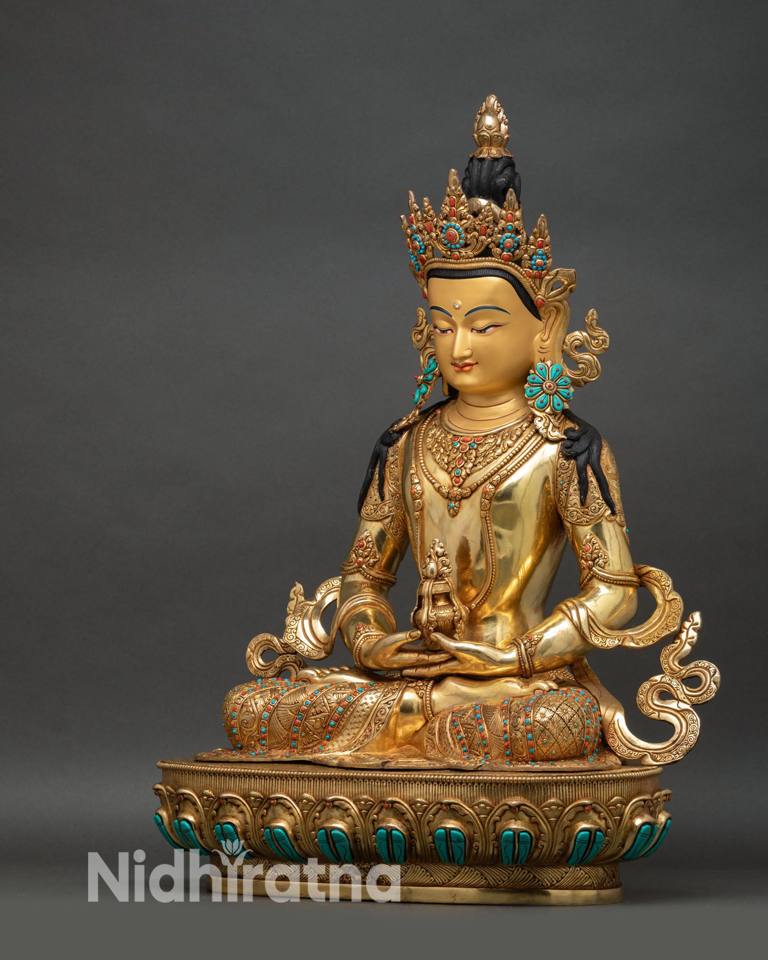 Amitayus statue left side view, finely detailed robes, gold gilded copper Buddhist art Nepal