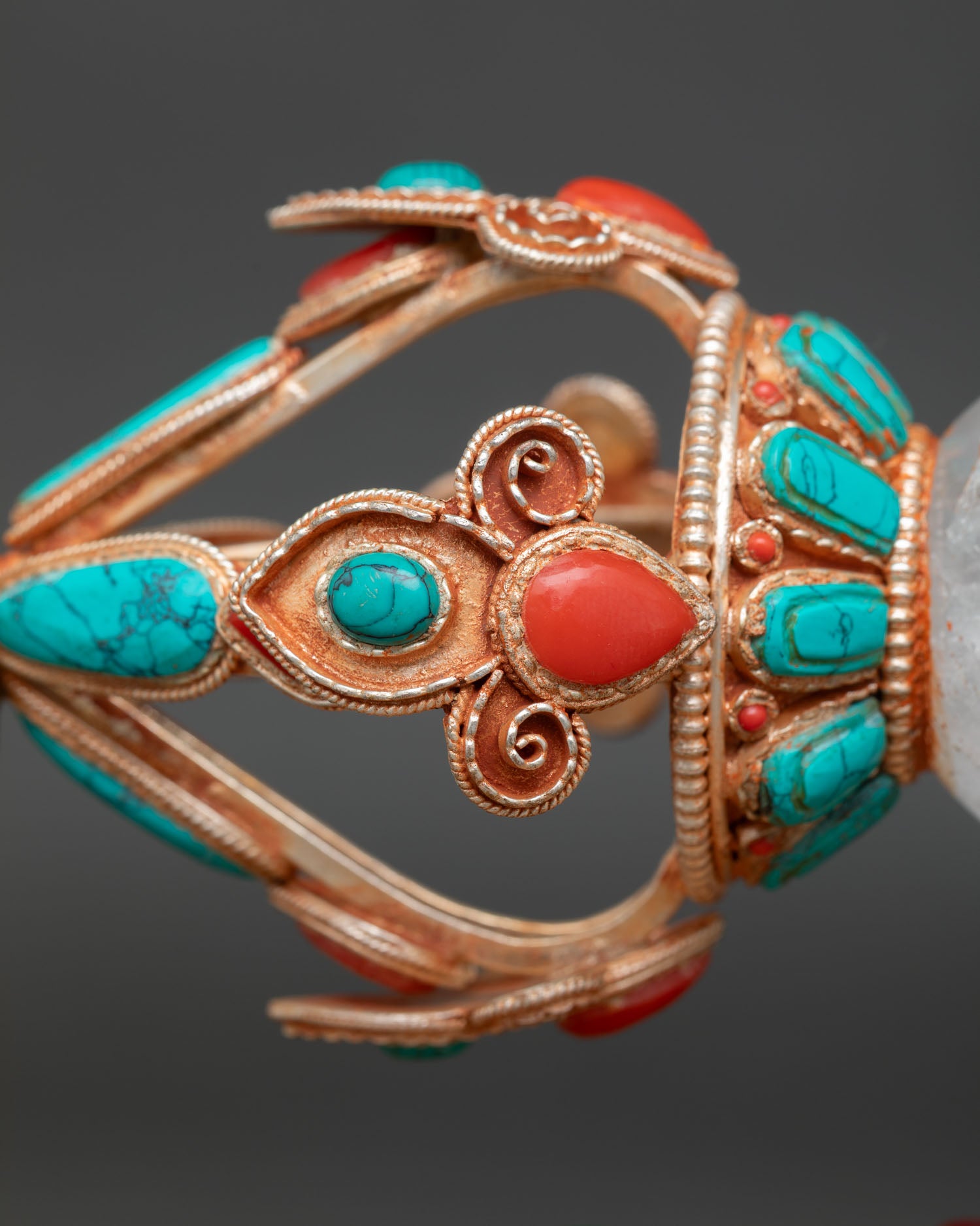 angled view of sacred vajra resting on decorative stand used for buddhist altar and meditation practice