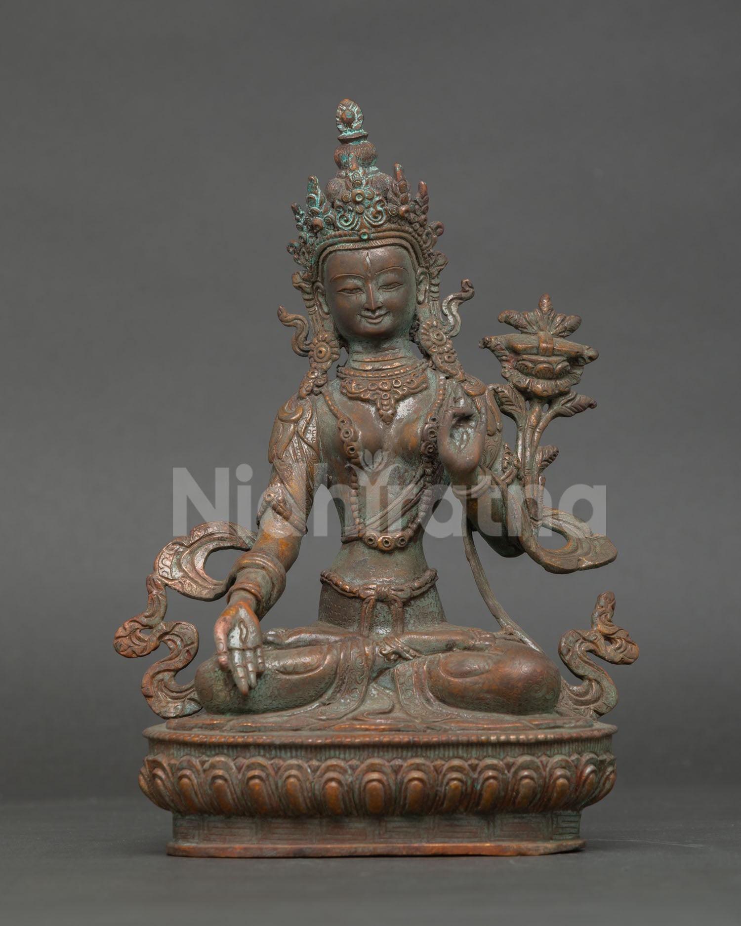 antique finished white tara statue seated on lotus throne, handcrafted copper buddhist art nepal