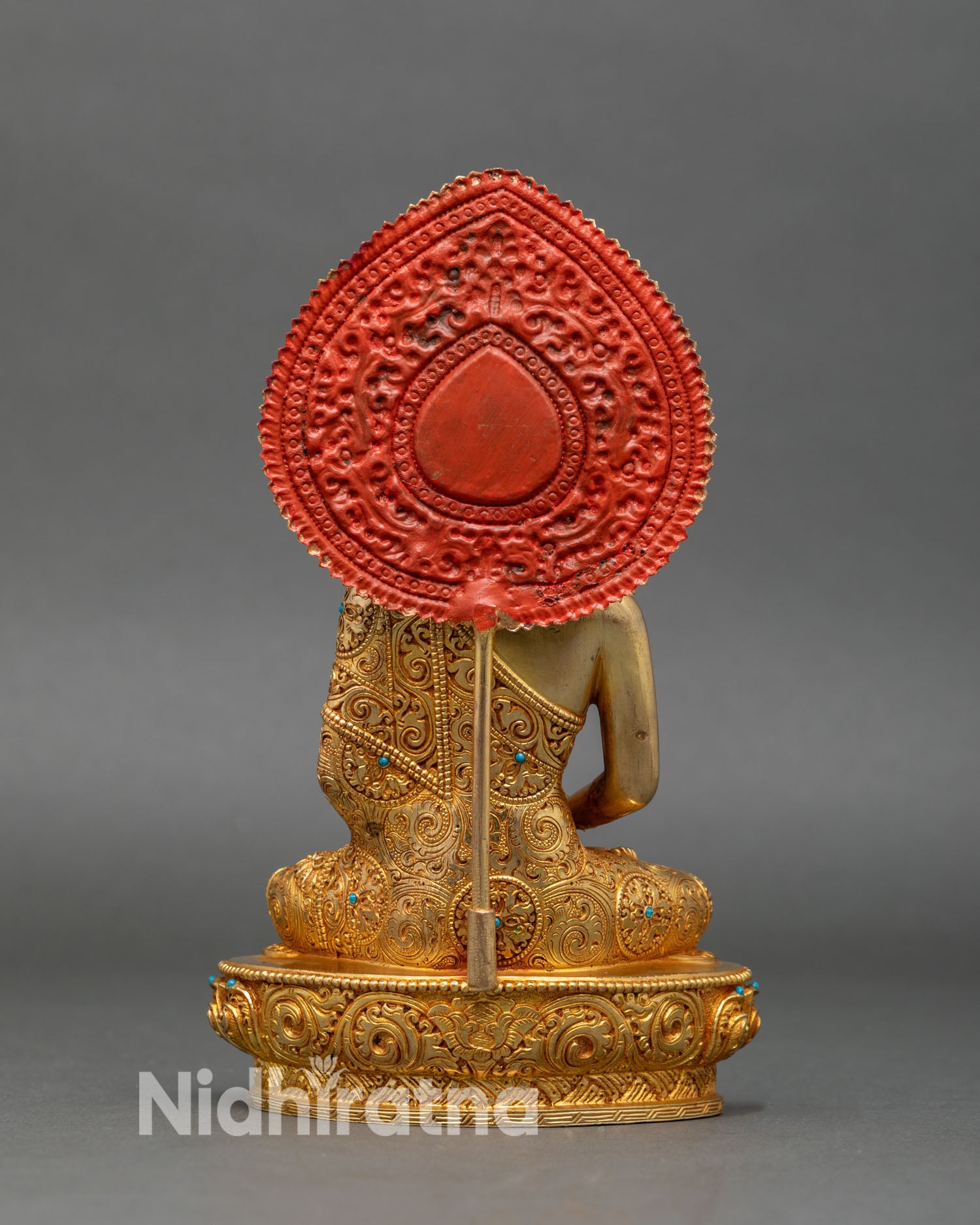 Back view of Amitabha Buddha statue, engraved lotus seat and detailed halo design