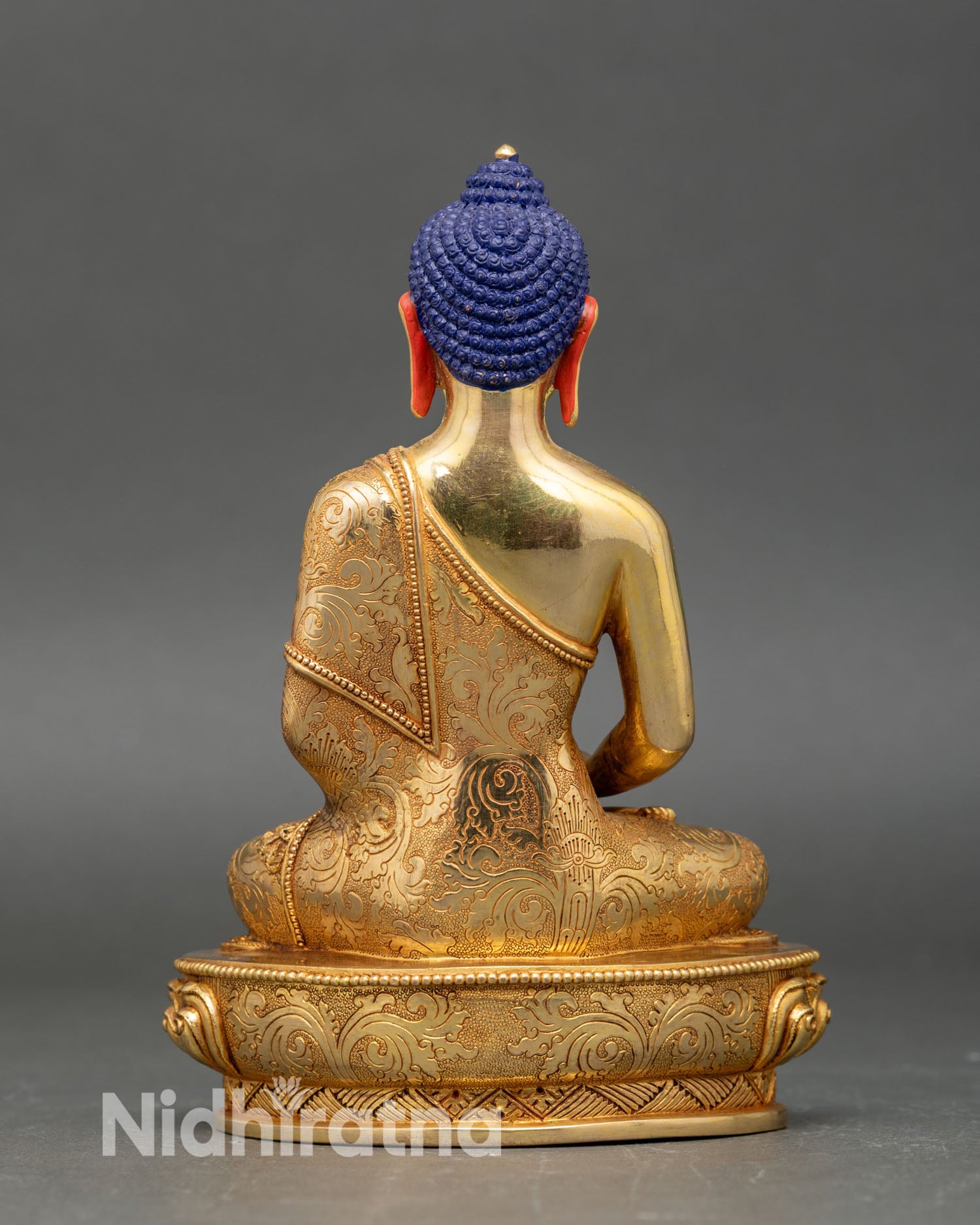 Back view Amitabha Buddha statue intricate lotus pedestal and hand-engraved floral motifs