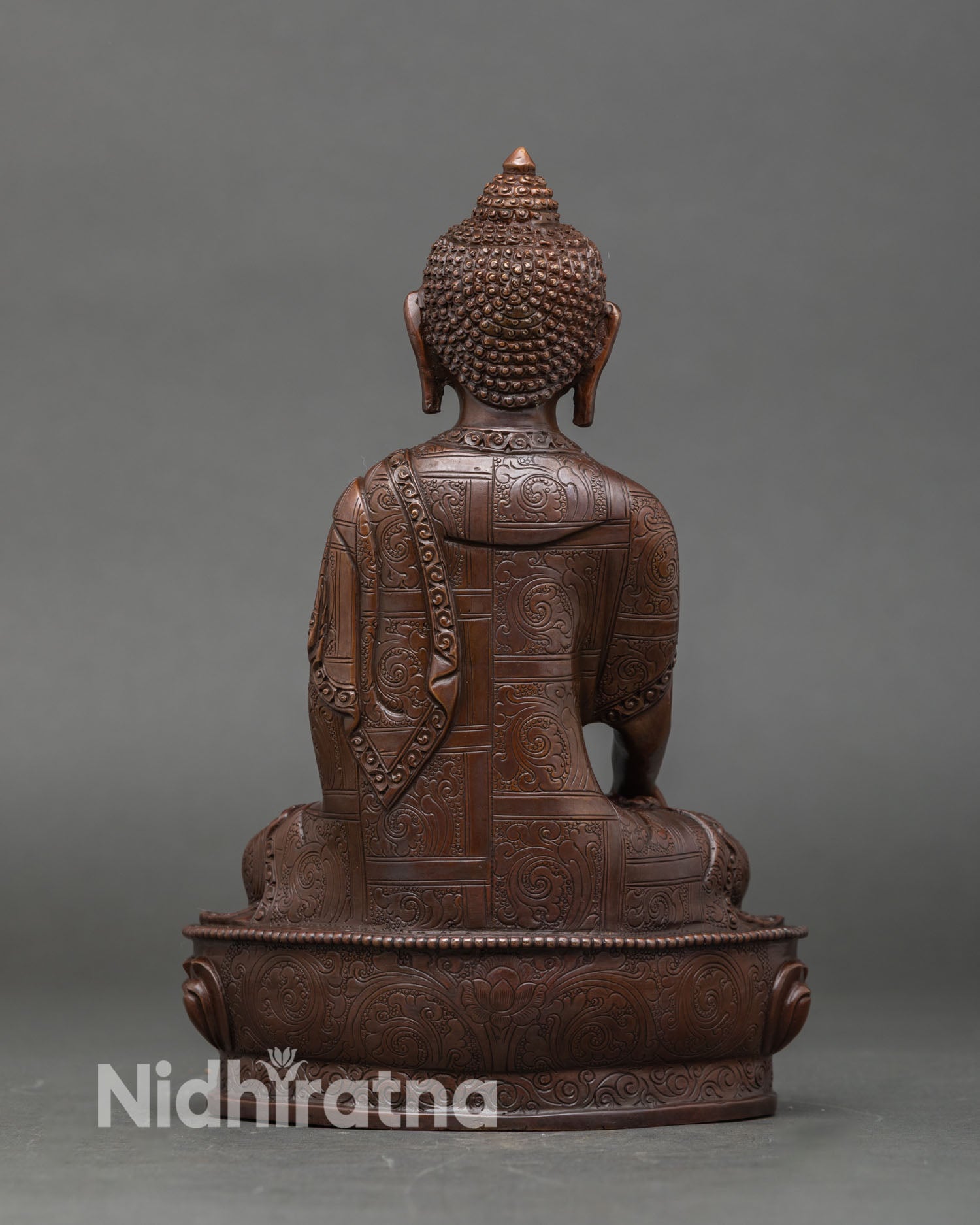 Back view Buddha sculpture oxidized copper Himalayan Buddhist sacred art