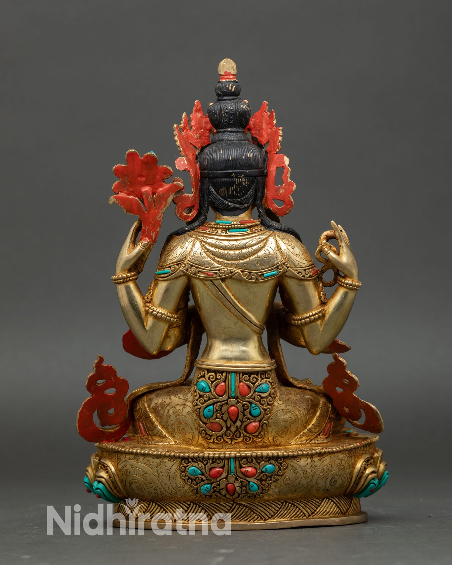 Back view of Chenrezig statue handcrafted copper alloy fire gilded Patan Nepal