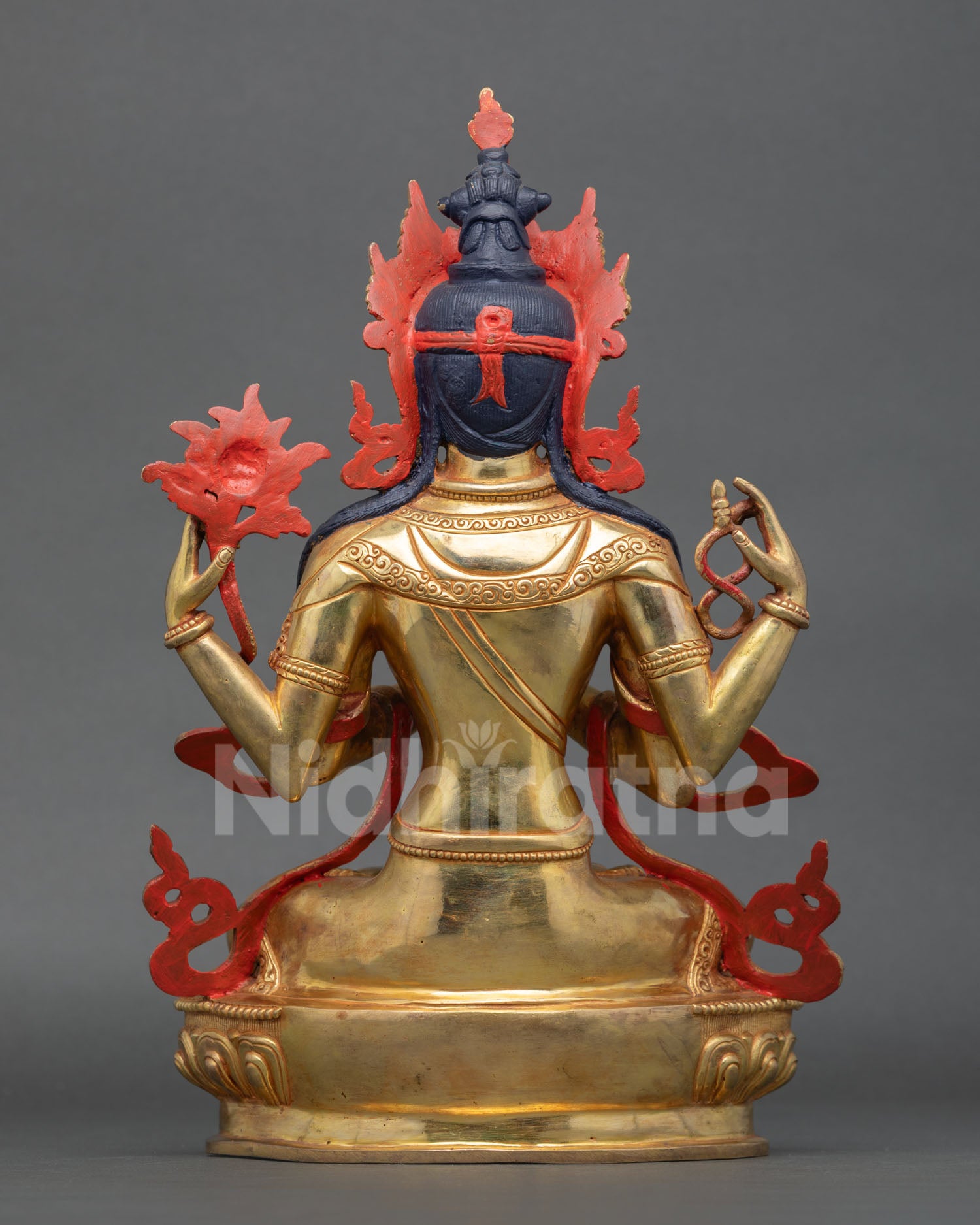 Back view of Chenrezig statue handcrafted Nepal copper 24K gold finish, intricate detailing flowing ornaments, Buddhist compassion deity sculpture