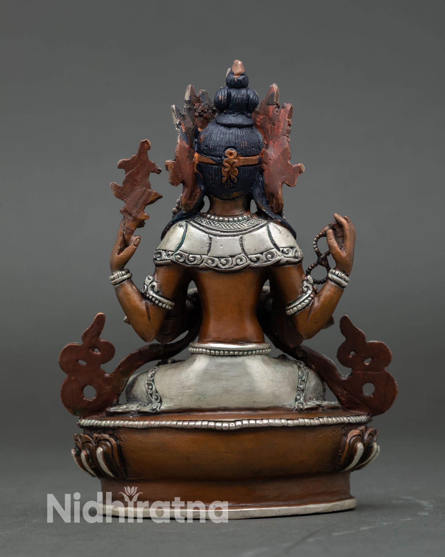 Back view of Chenrezig statue, lost wax casting, oxidized copper finish, detailed lotus throne, Tibetan Buddhist meditation altar decor
