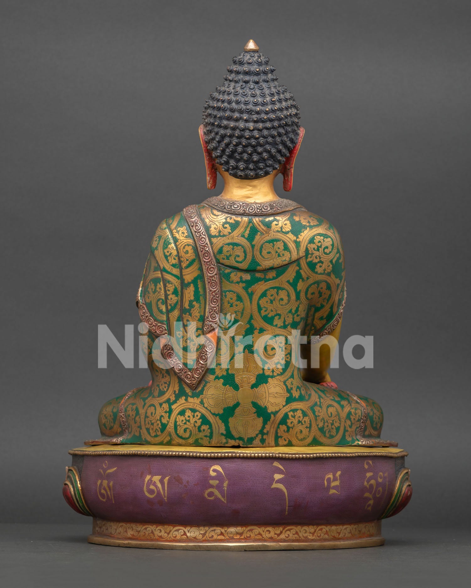 Back view of copper Buddha Shakyamuni statue showcasing traditional Newari craftsmanship