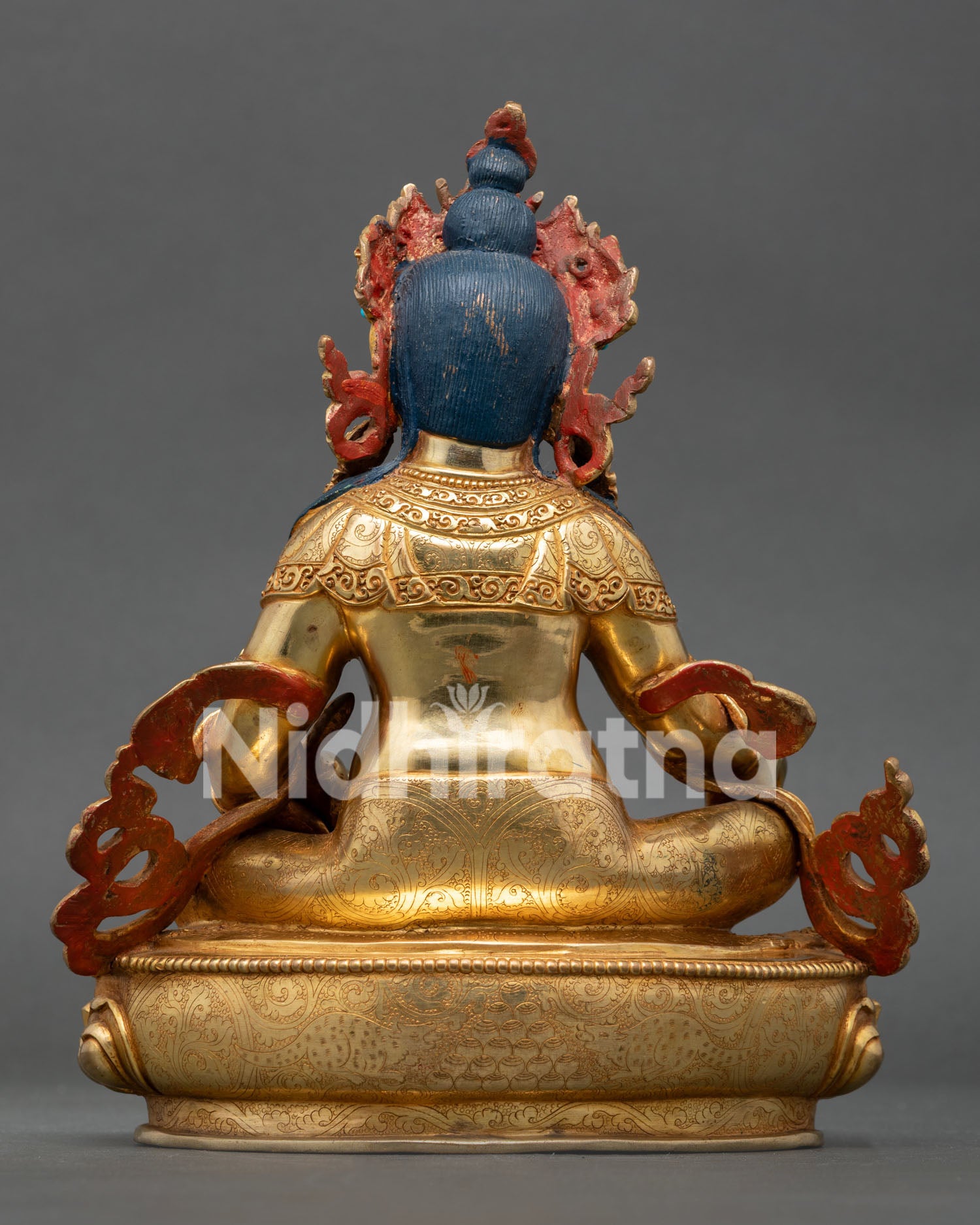 Back view of Dzambhala statue, handcrafted Nepal copper gold finish, intricate details, sacred wealth deity sculpture
