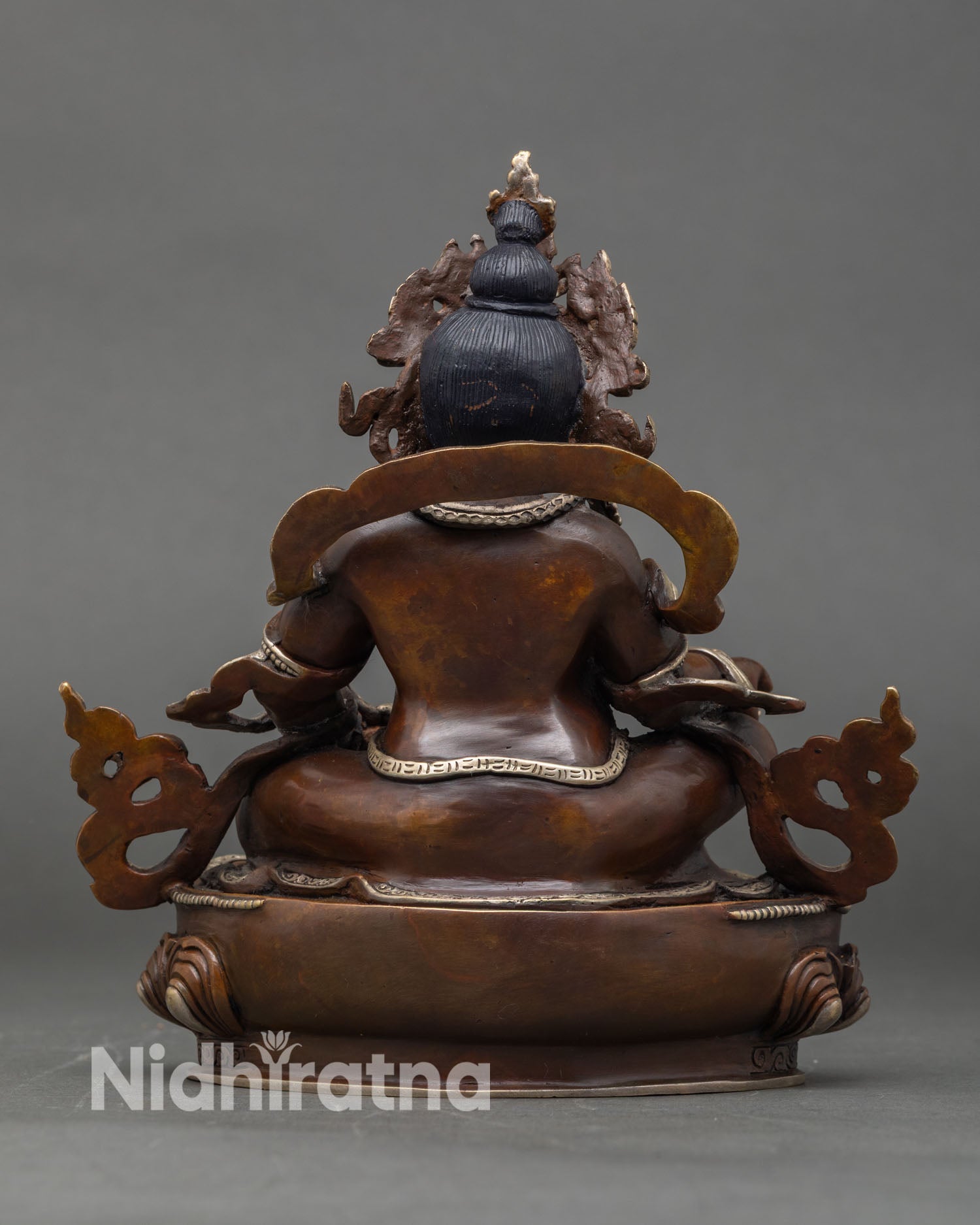 Back view Dzambhala statue handcrafted Nepalese Tibetan Buddhist deity sacred art