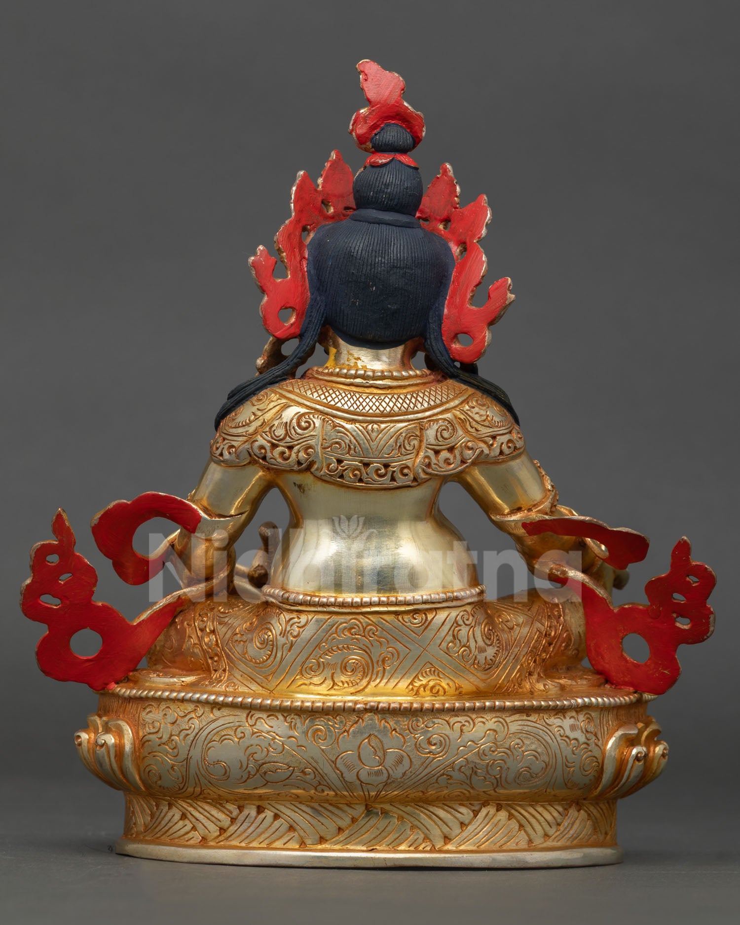 Back view of Dzambhala Statue, handmade sacred Buddhist artwork, gold detailing wealth and prosperity deity art