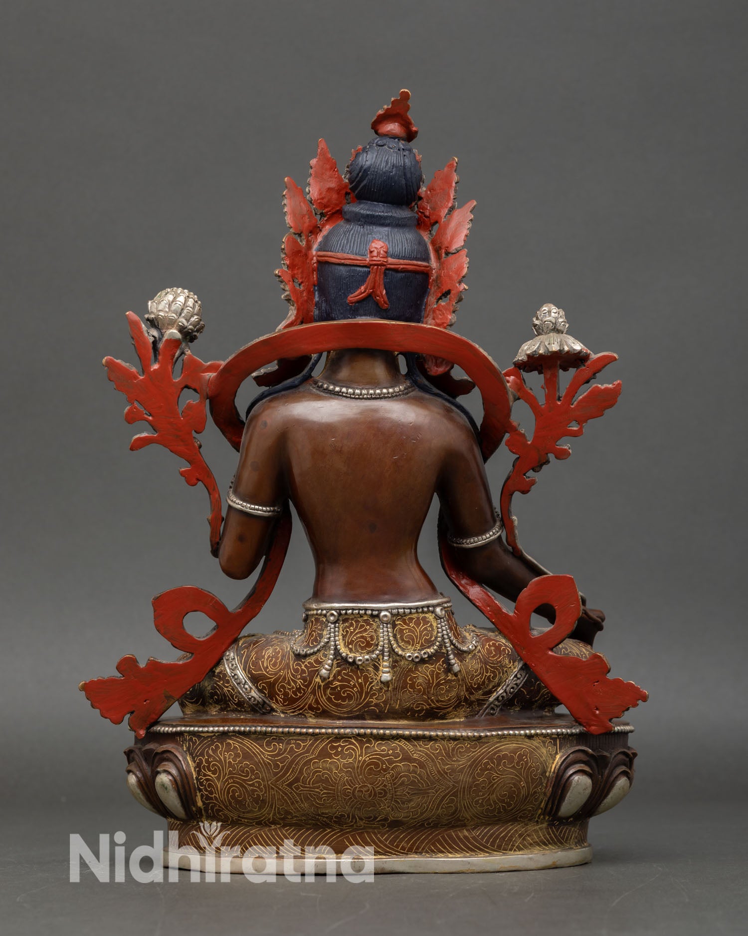 Back view of Green Tara statue detailed five-jewel crown handcrafted Nepalese art