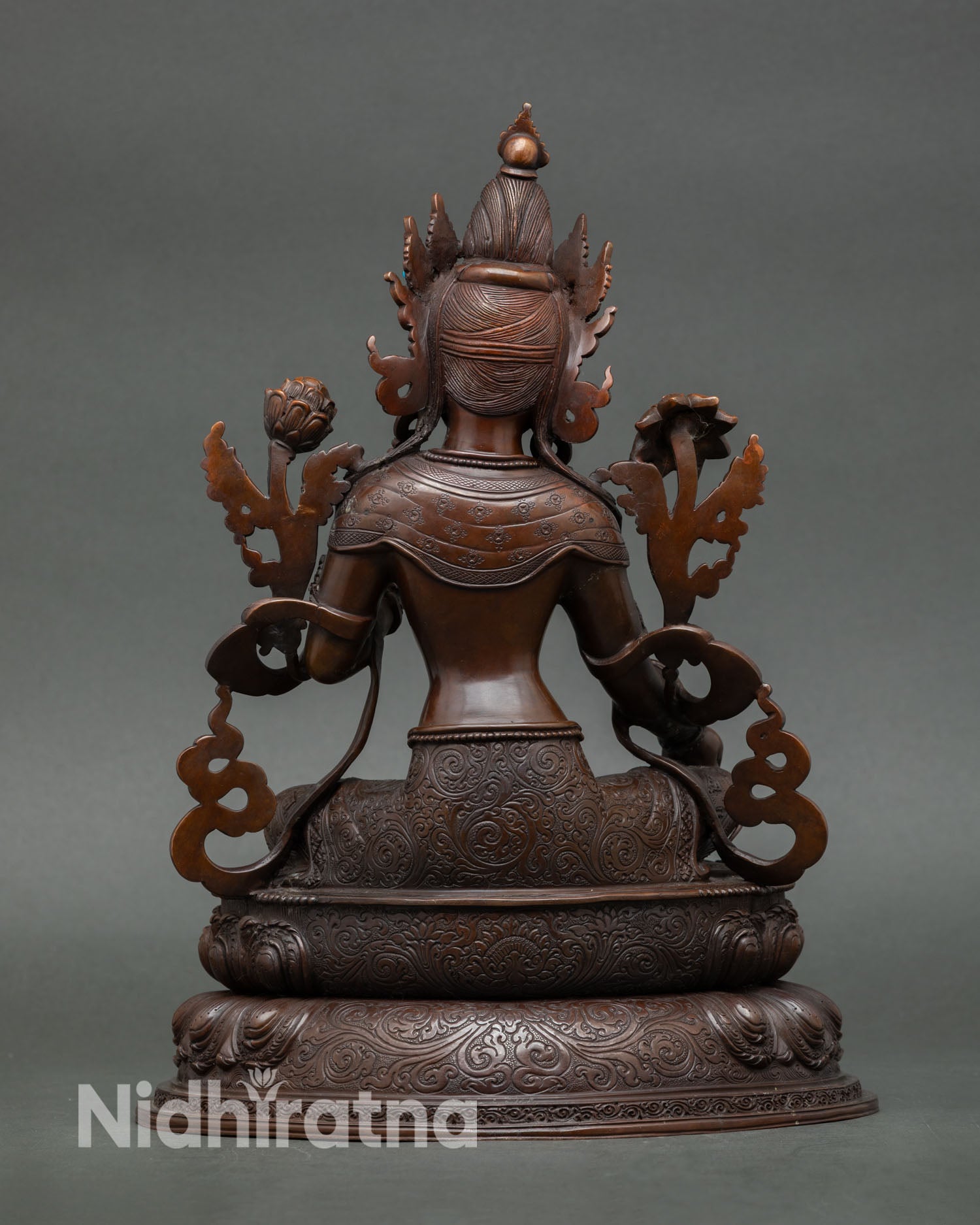 Back view Green Tara statue handcrafted nepal oxidized finish double lotus throne detailed engraving spiritual decor