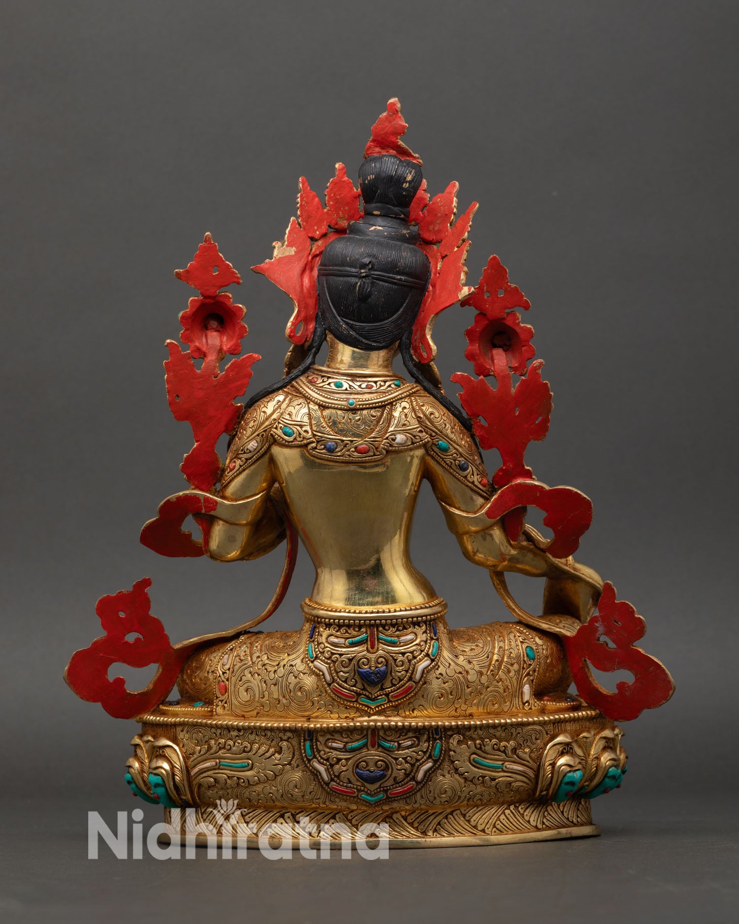 Back view of green tara statue radiant gold copper finish nepal buddhist art intricate jewelry details