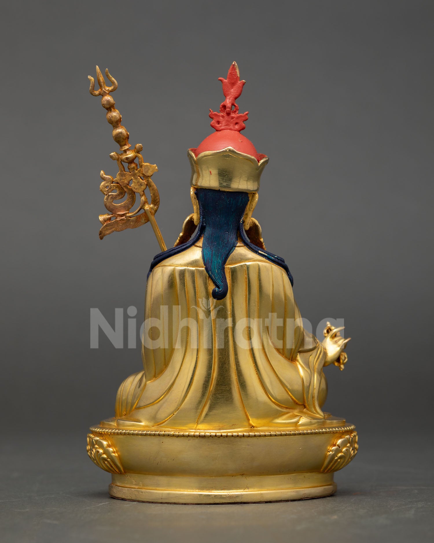 Back view of the Guru Rinpoche statue gold gilded copper finish traditional Buddhist deity sculpture meditation shrine home altar decor