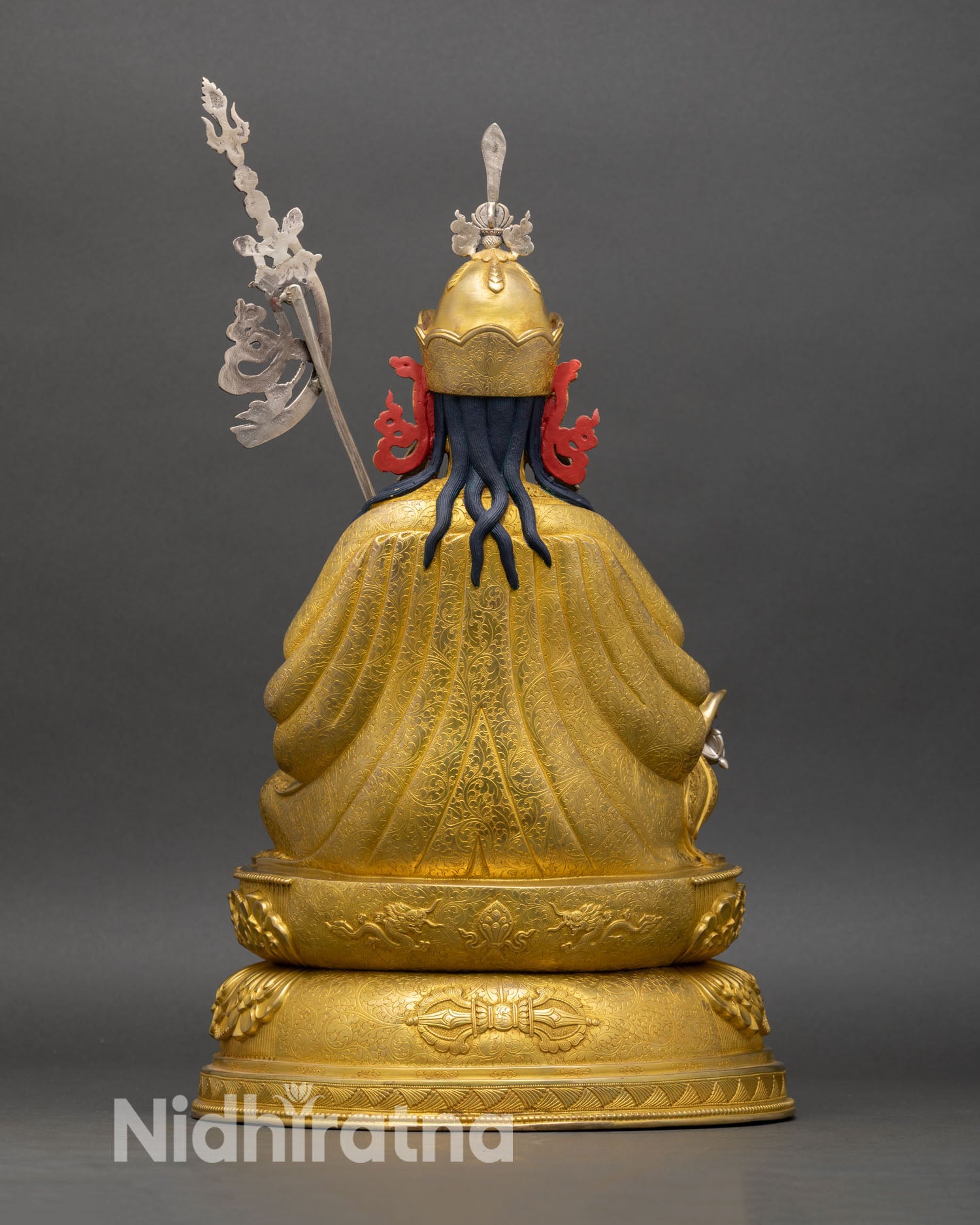 Back view of Guru Rinpoche statue handcrafted oxidized copper detailed Nepal artisan spiritual statue