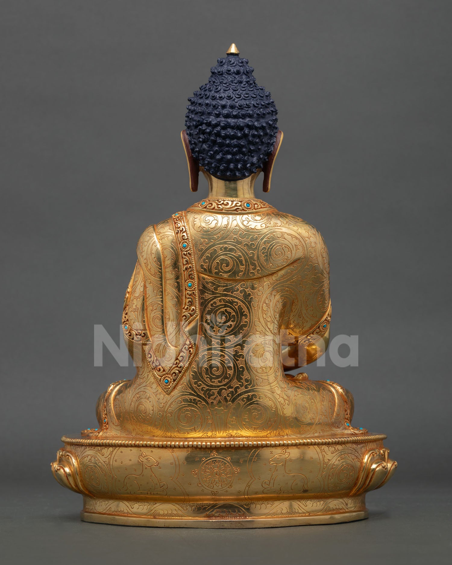 Back view of handcrafted Amitabha Buddha statue from Nepal showcasing traditional metal craftsmanship and gold detailing