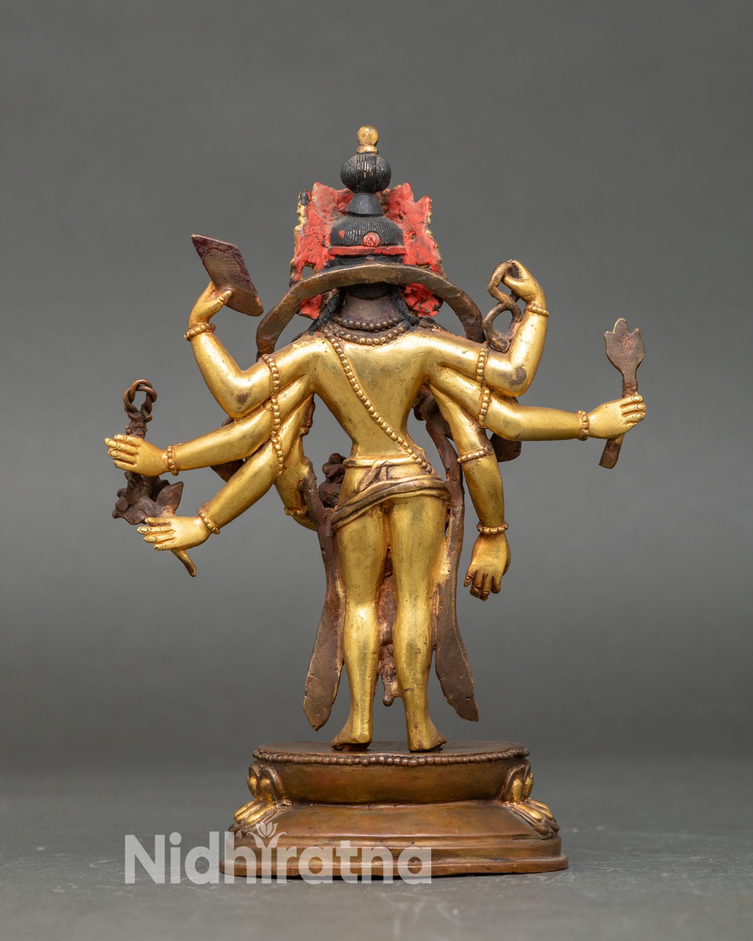 Back view handcrafted Amoghapasa Lokeshvara statue Nepal copper sculpture gold gilded, sacred Buddhist altar decor Himalayan art
