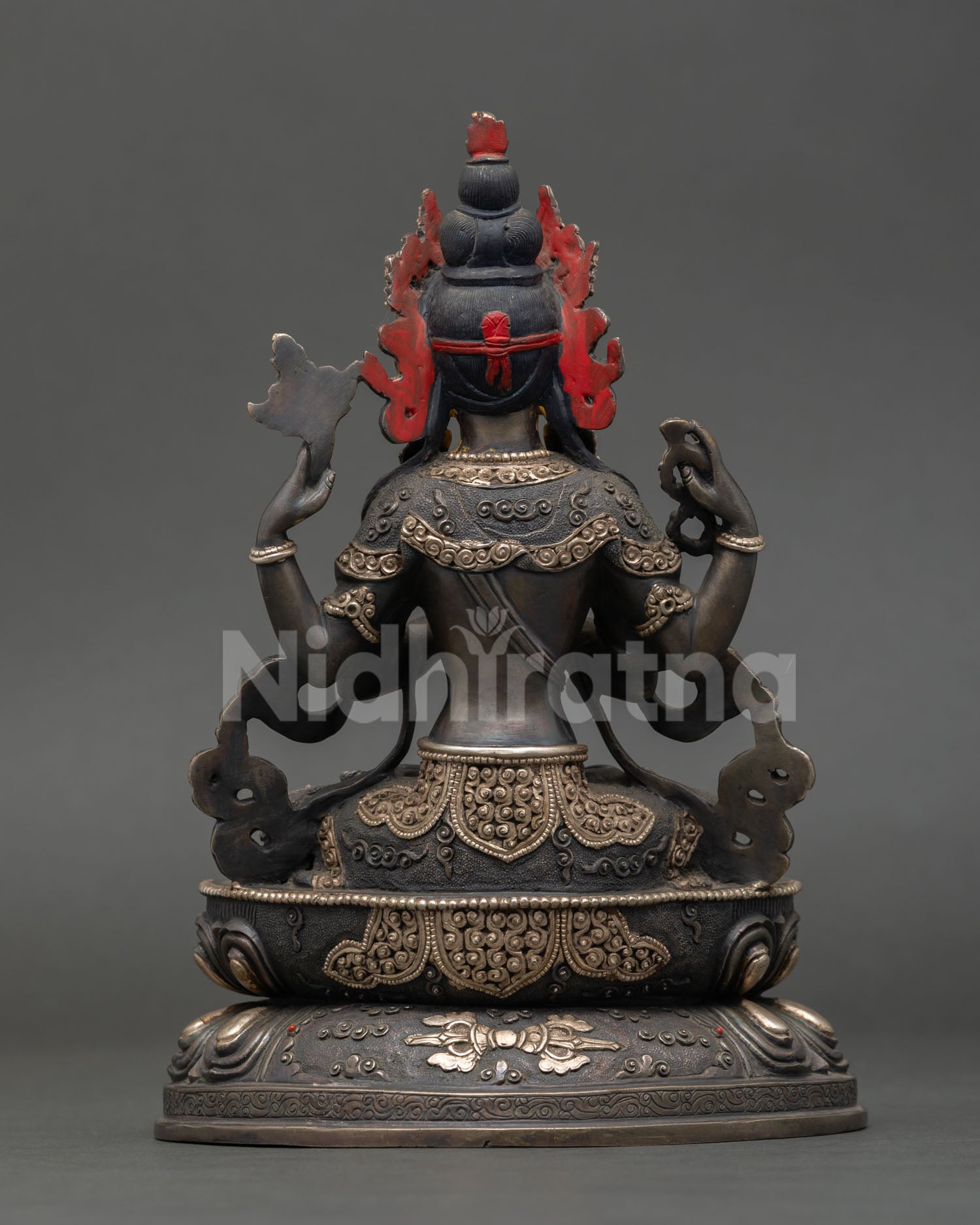 Back view of handcrafted Chenrezig statue from Patan Nepal oxidized copper artwork sacred Buddhist sculpture for altar and home decor