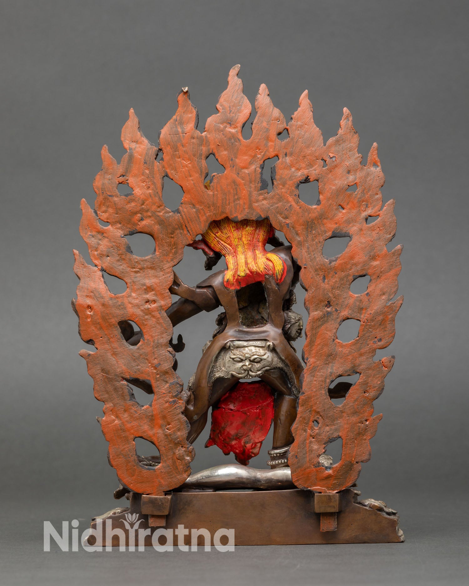 Back view of handcrafted Drogdze Wangmo statue from Patan Nepal oxidized copper sculpture silver plated details sacred Himalayan altar decor art