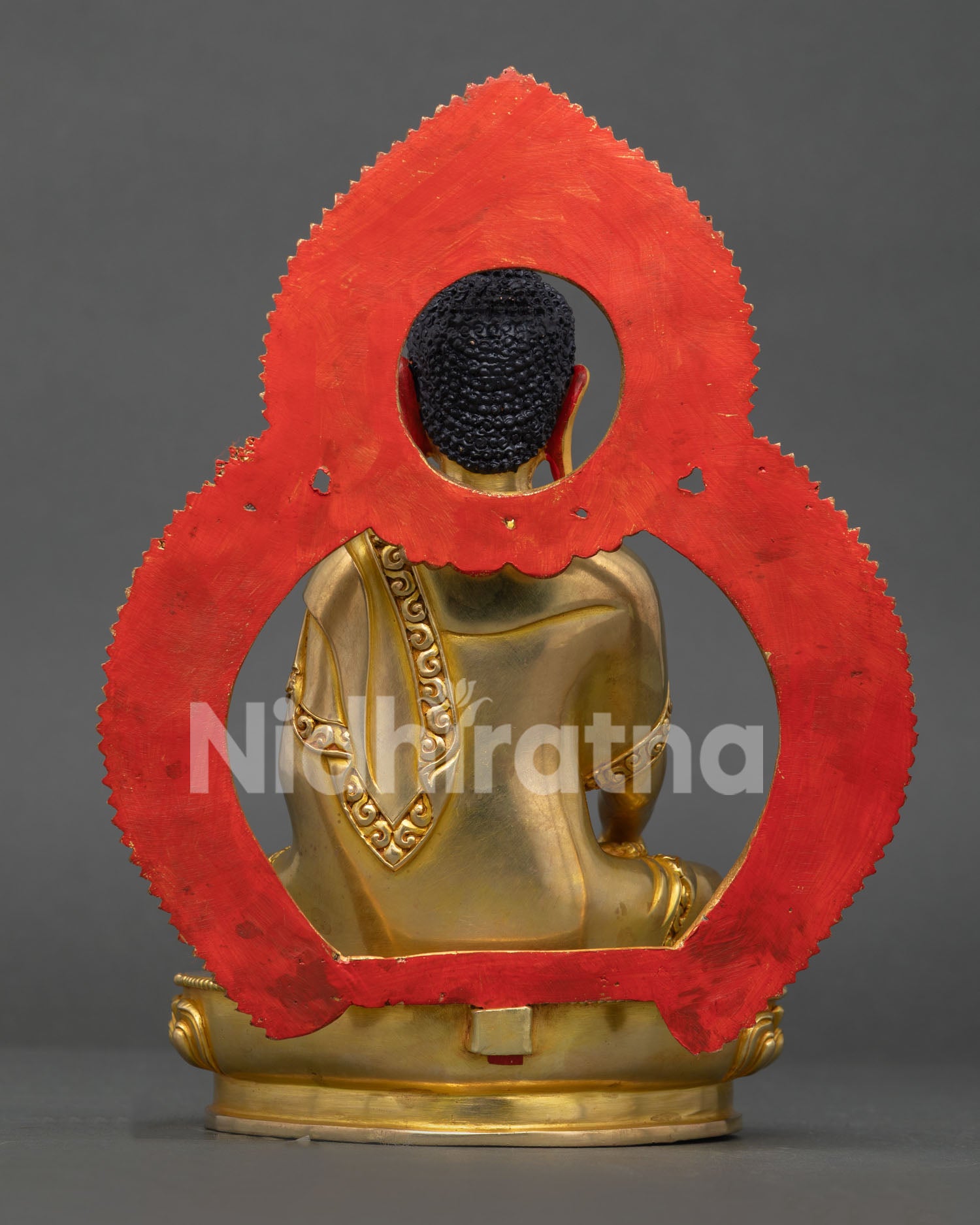 Back view of handmade Shakyamuni Buddha statue with detailed copper craftsmanship from Nepal