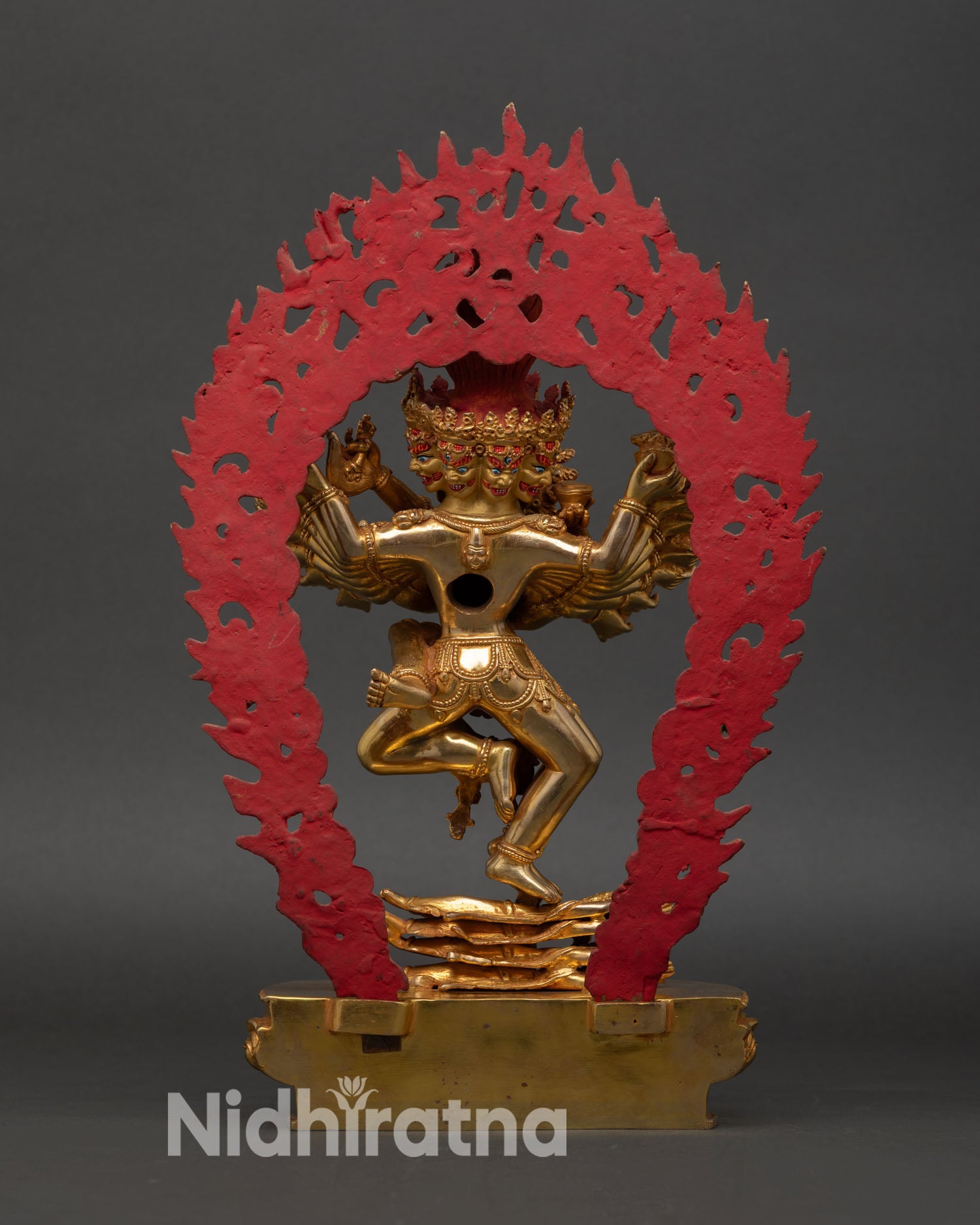 Back view of Hevajra statue handcrafted Nepal copper gold detailing multi headed deity intricate carving sacred Vajrayana Buddhist art