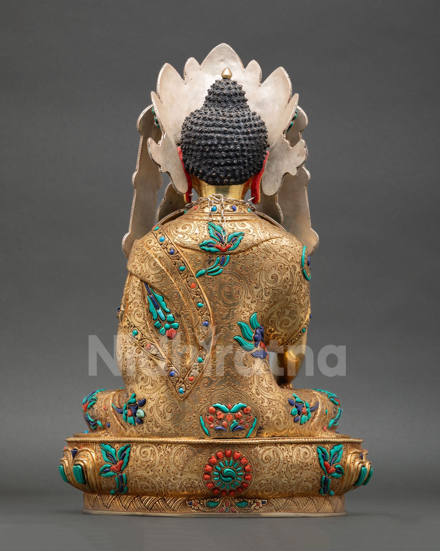 Back view Jowo Rinpoche statue ornate ceremonial robe detailing copper sculpture Tibetan sacred art Jokhang Temple inspired Buddha figure