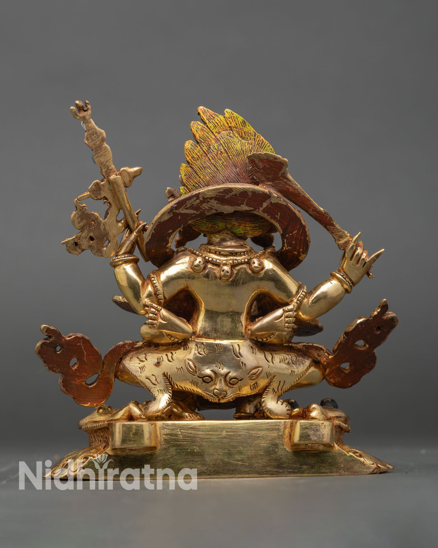Back view of Mahakala consort handcrafted statue intricate detailing lost wax copper casting spiritual protector deity home altar decor