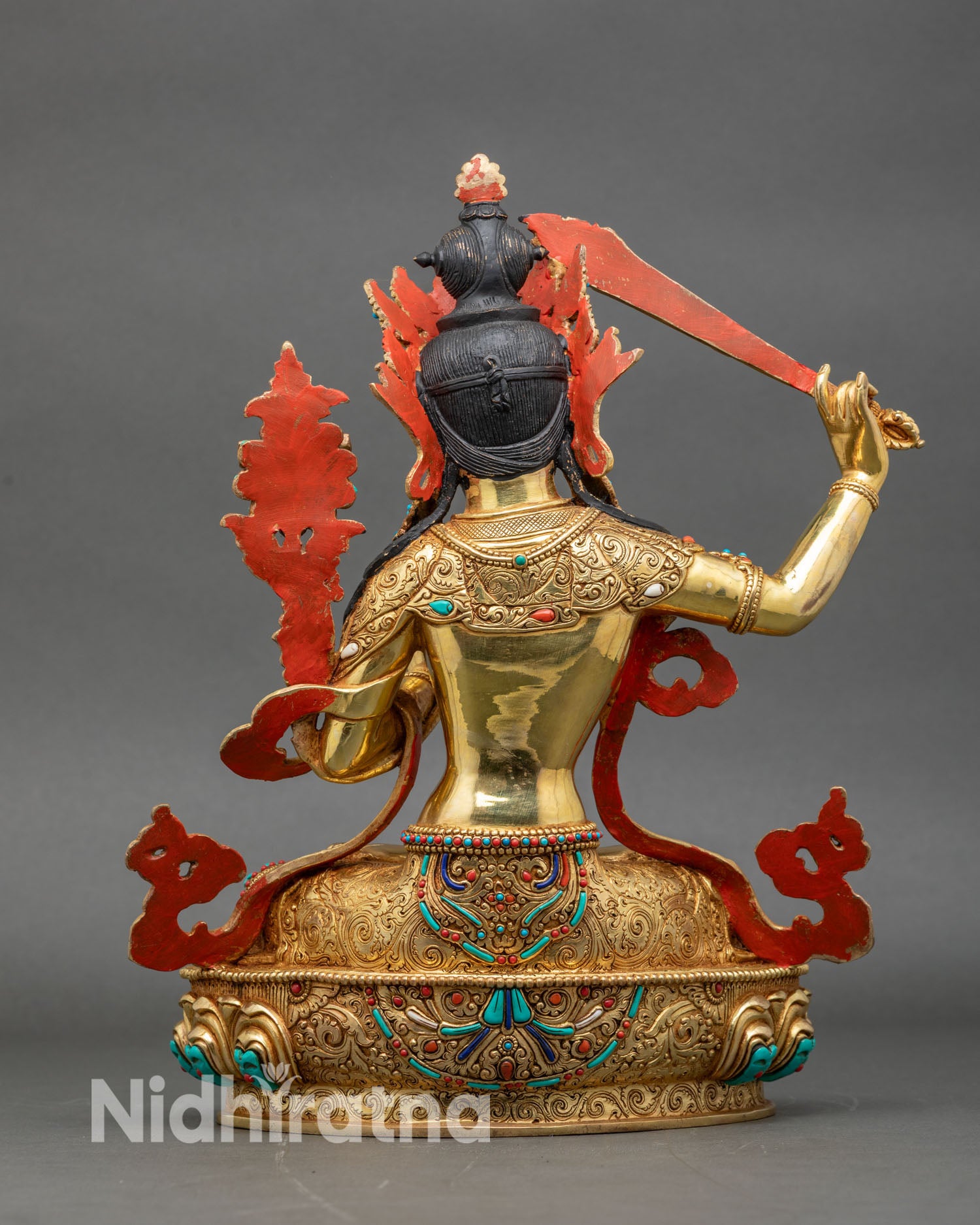 Back view Manjushree statue ornate crown copper scrollwork hand-set stones