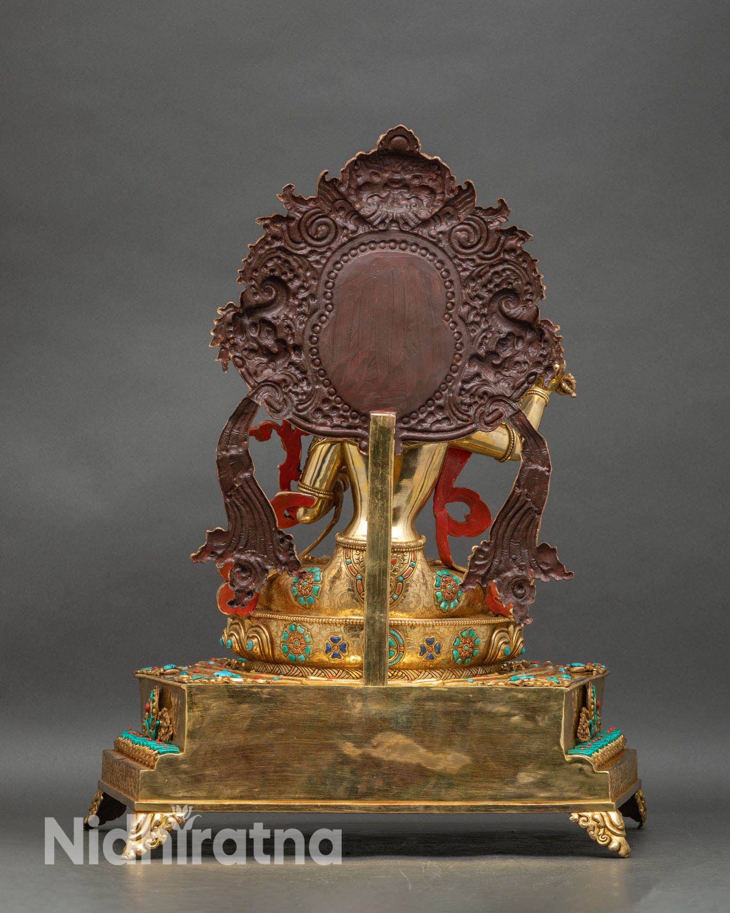 manjushri statue rear view showing multi-tiered throne, turquoise and coral inlays