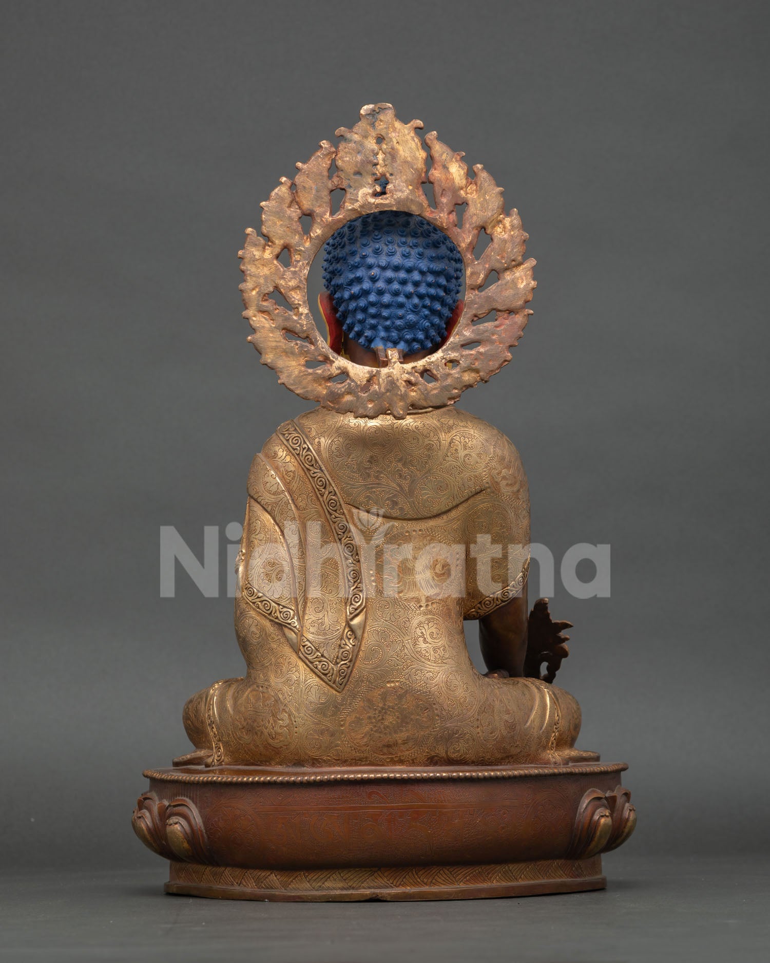 back view medicine buddha statue copper lotus pedestal intricate engraving