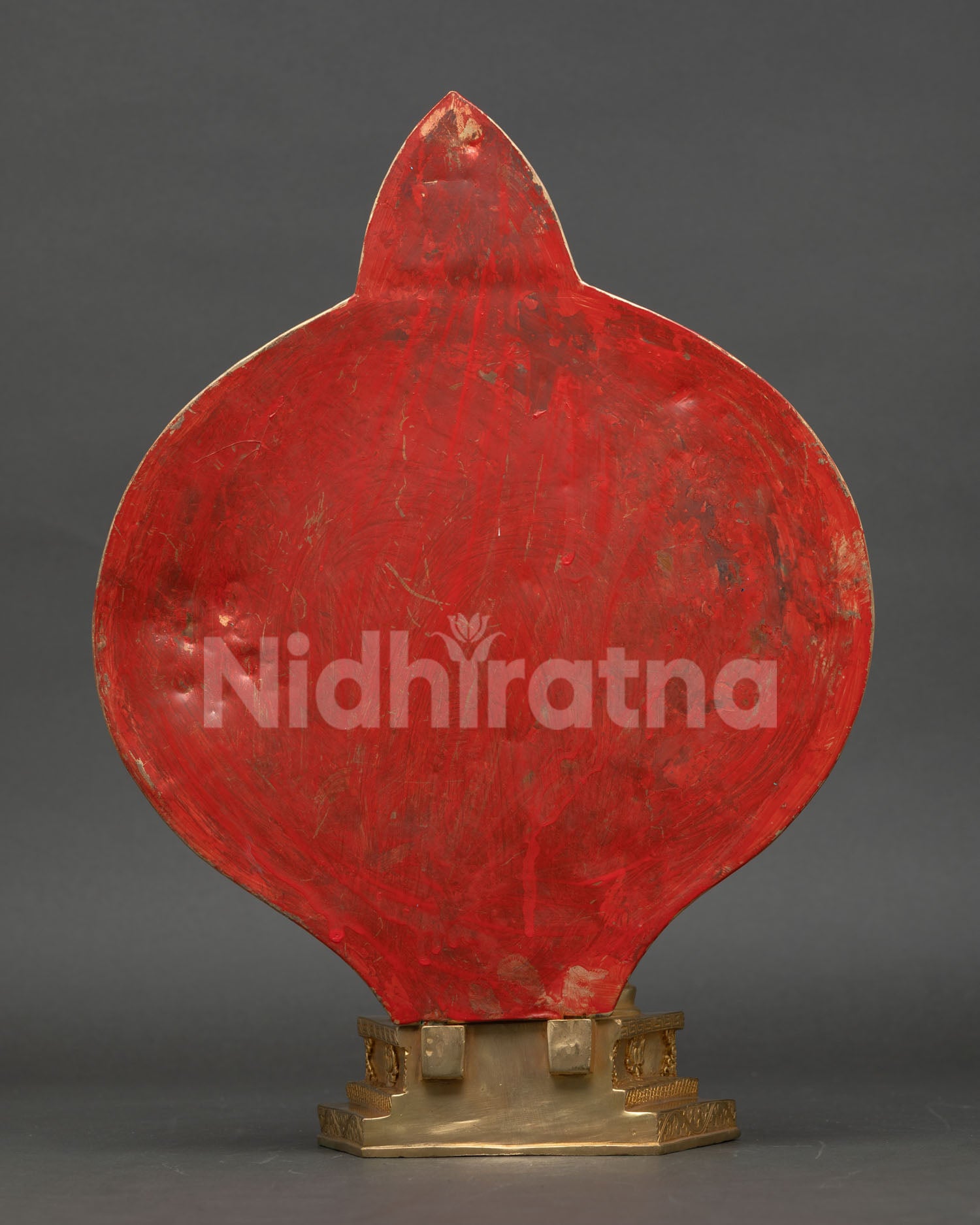 back view of 1000 armed chenrezig statue showing detailed halo and copper craftsmanship