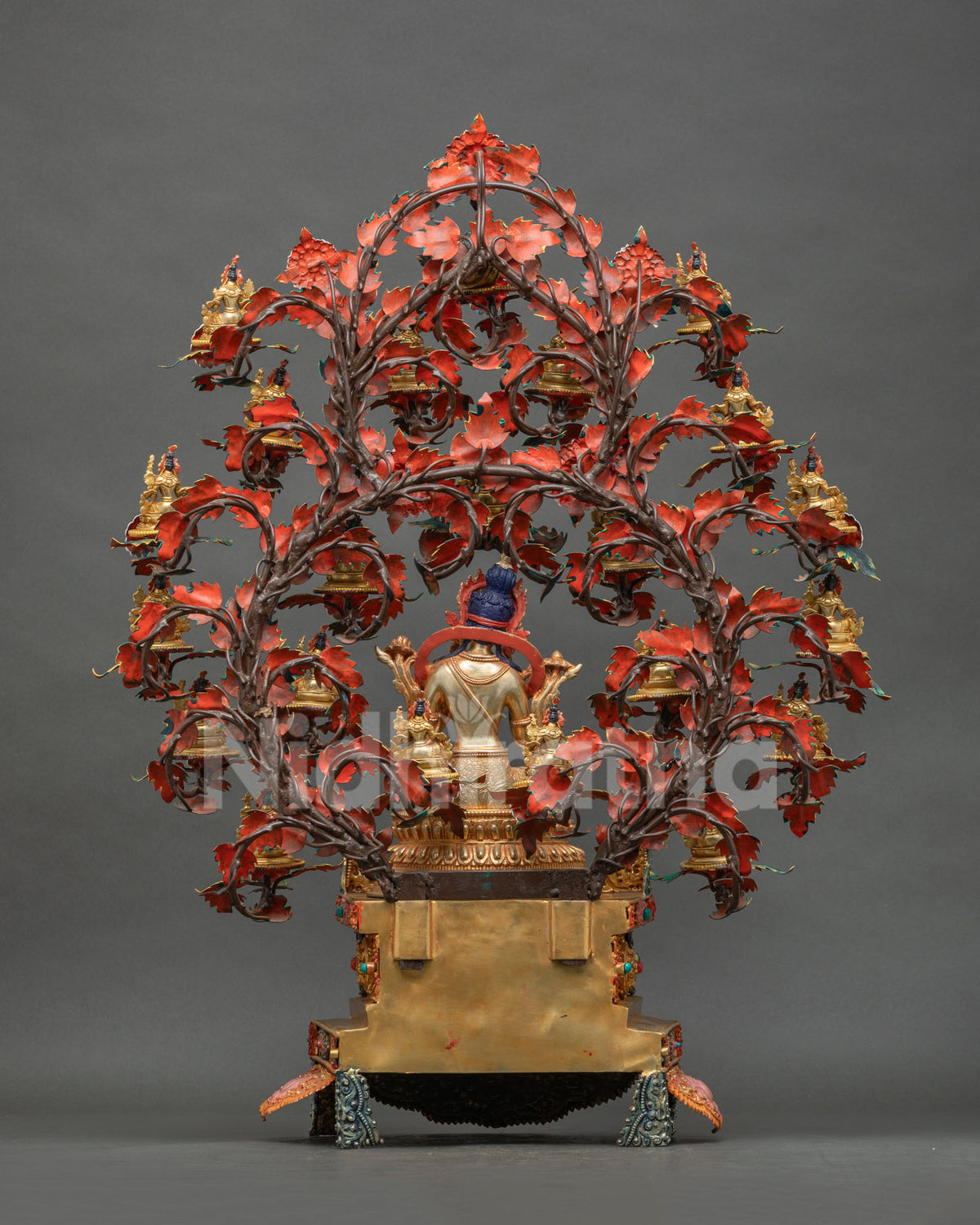 Back view of 21 Tara Statue Set showing copper tree branches with red-painted leaves