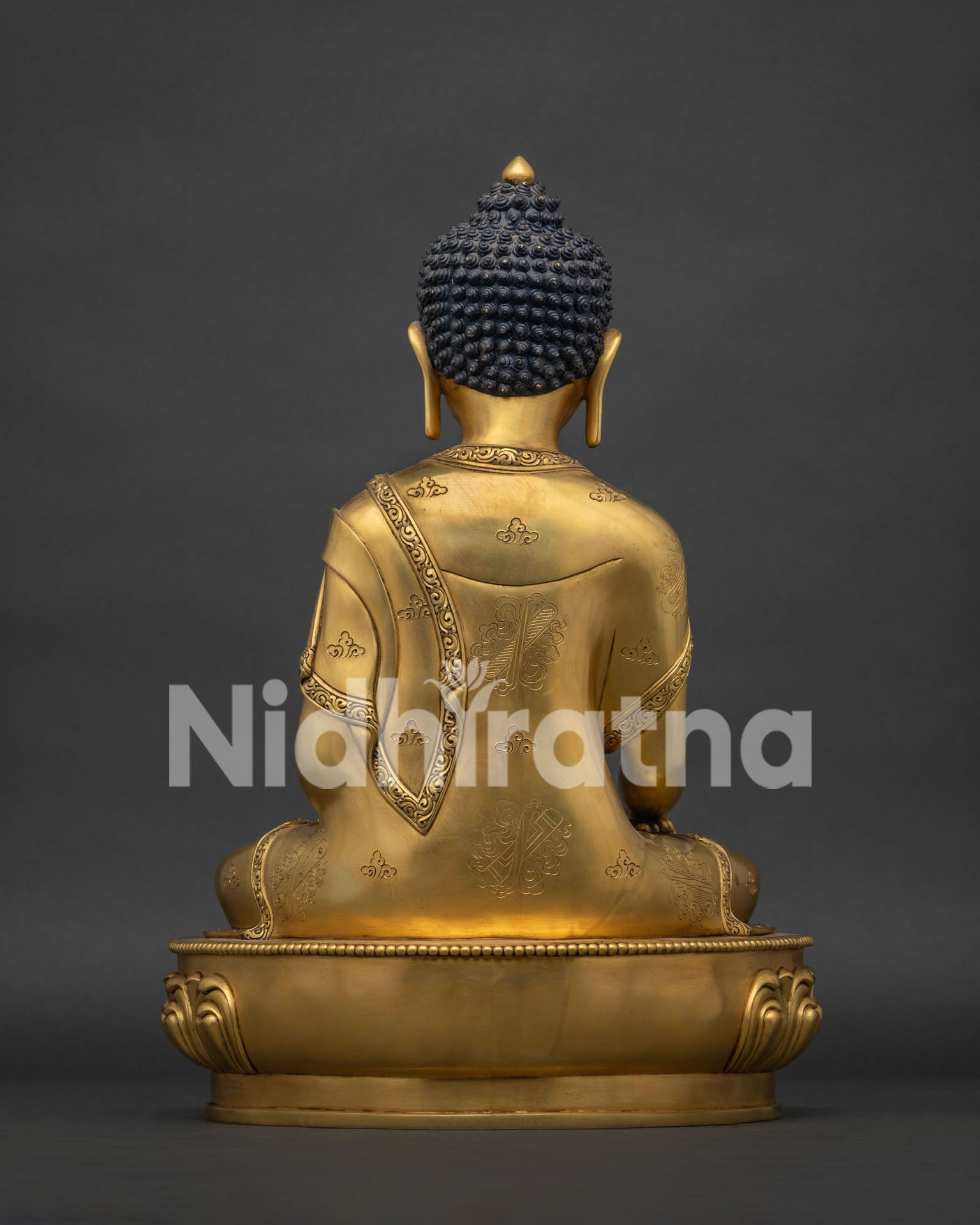 back view of 24k gold fire gilded shakyamuni buddha statue ashtamangala carved robe nepal