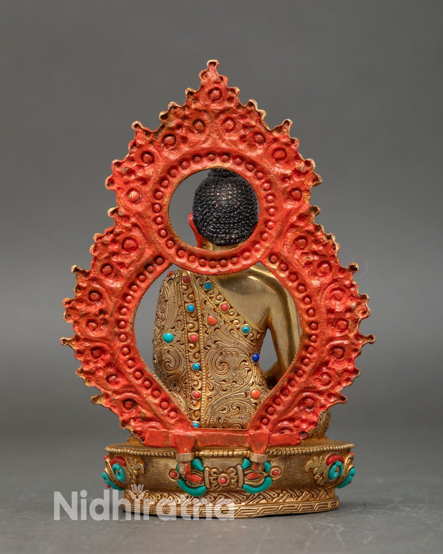 Back view of Amitabha Buddha statue, gold-gilded copper with decorative halo for spiritual decor.