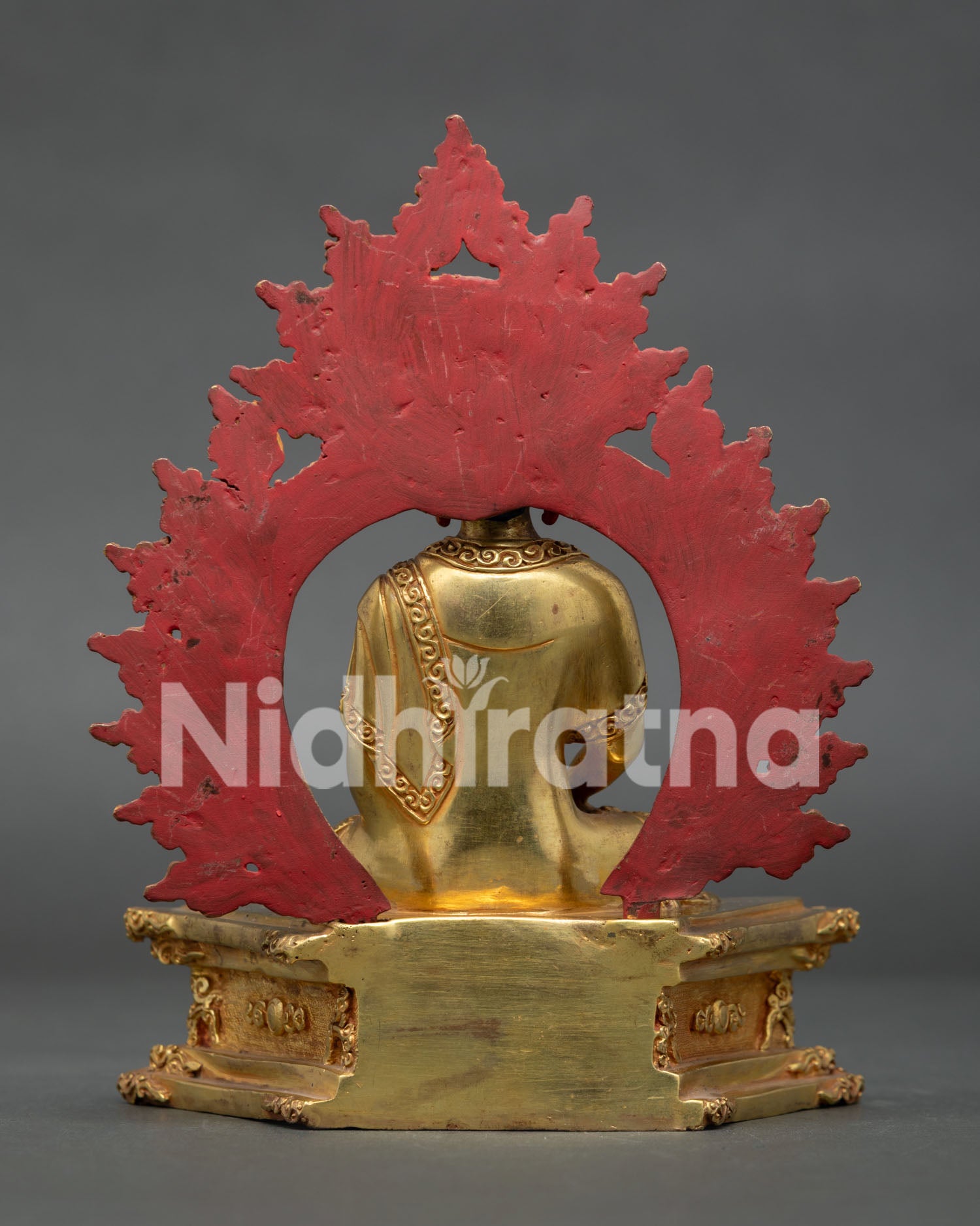 Back view of Amitabha Buddha statue showing halo and royal throne handcrafted in Nepal.