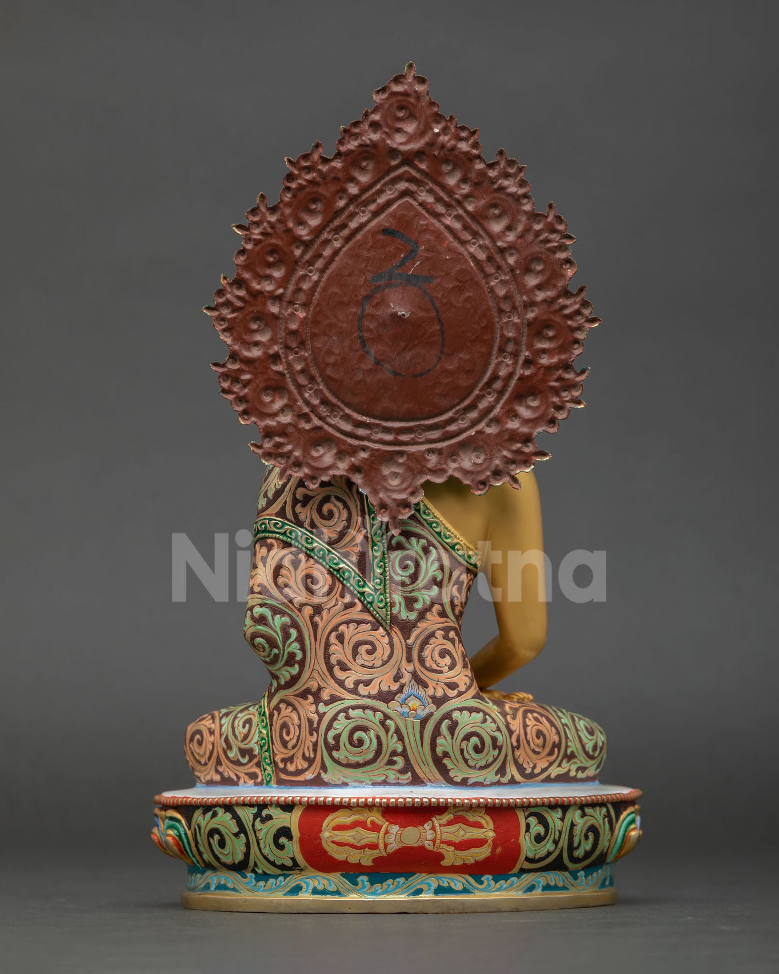 back view of Amitabha Buddha statue with detailed halo and robe patterns