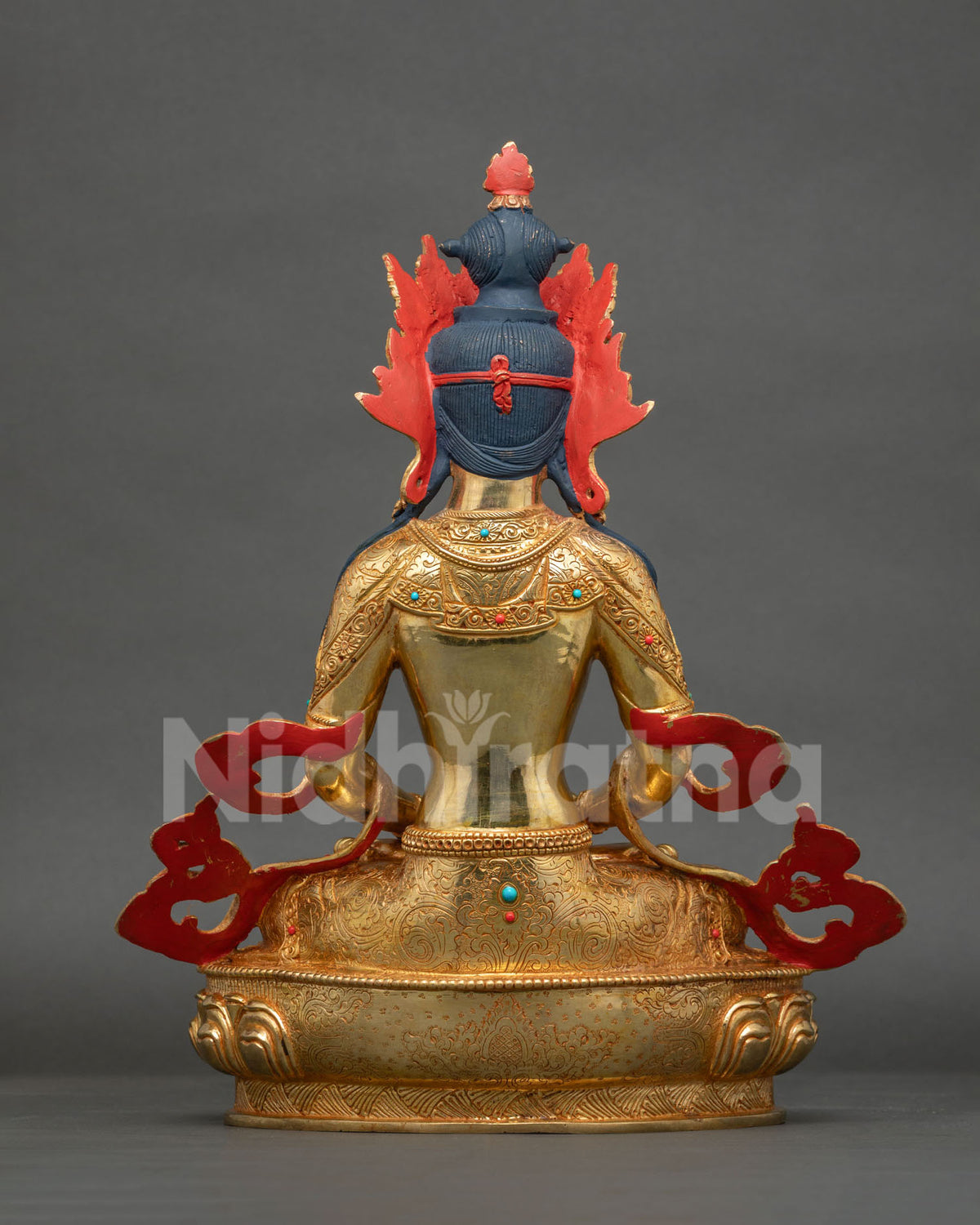 Back view of Amitayus Buddha statue with engraved gold robes and hand painted details, Nepal