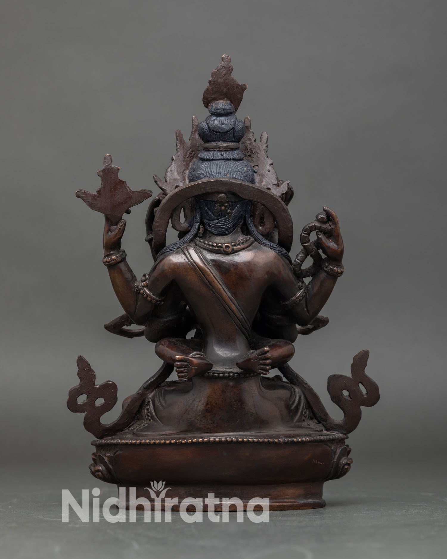 back view of chenrezig consort statue oxidized copper hand-painted details tibetan buddhist protector deity sculpture