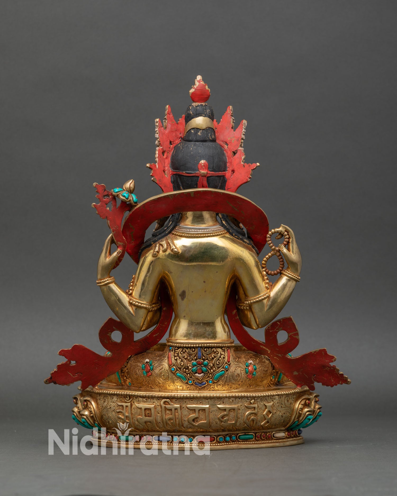 Back view of Chenrezig Statue, lotus pedestal and gold-gilded copper details