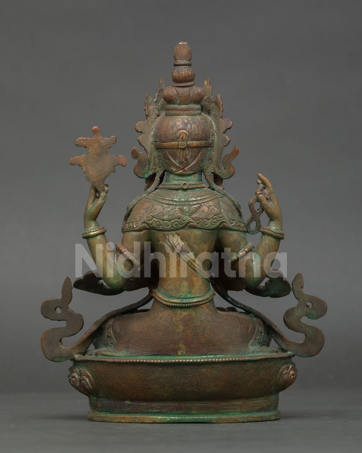 Back view of Chenrezig Statue showcasing detailed robes and traditional Nepalese craftsmanship