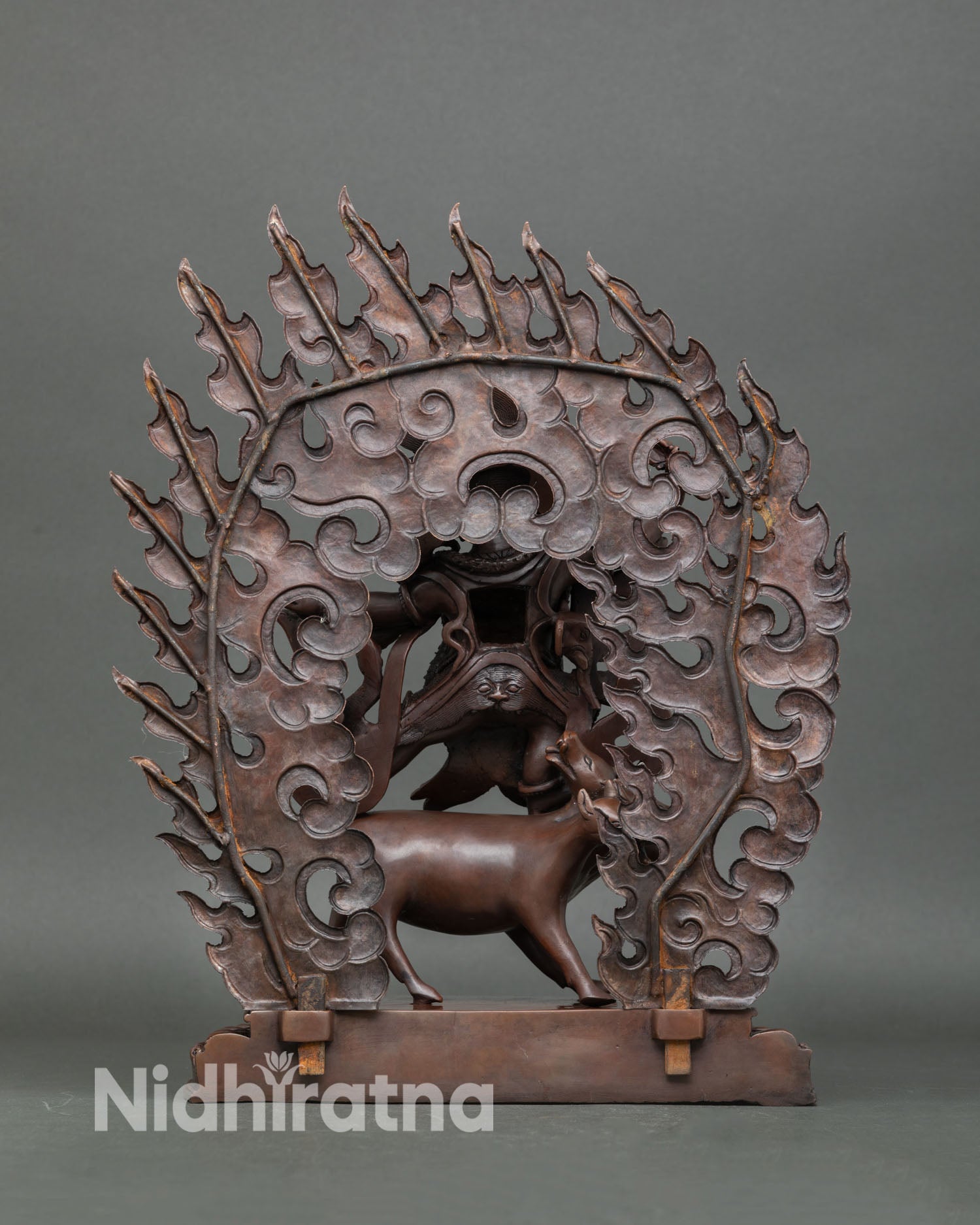 Back view of Dorje Gotrab statue Himalayan sacred sculpture with intricate flame detailing copper craftsmanship and traditional Newari artisan