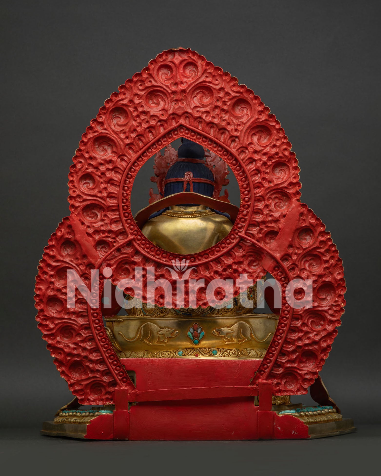 Back View of Genuine Handmade Dzambhala Statue with Floral Halo and Throne Engravings