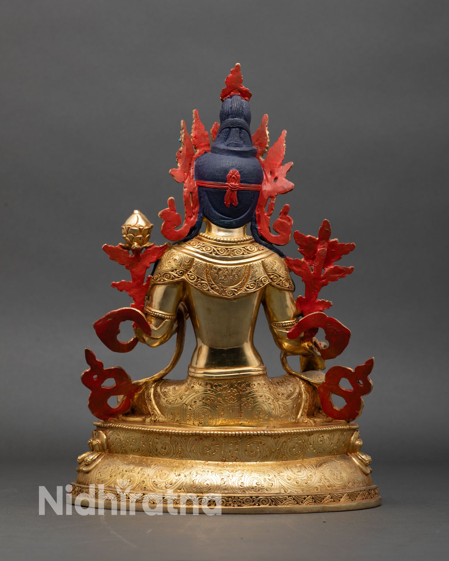Back view of Green Tara statue hand engraved robes traditional Nepalese