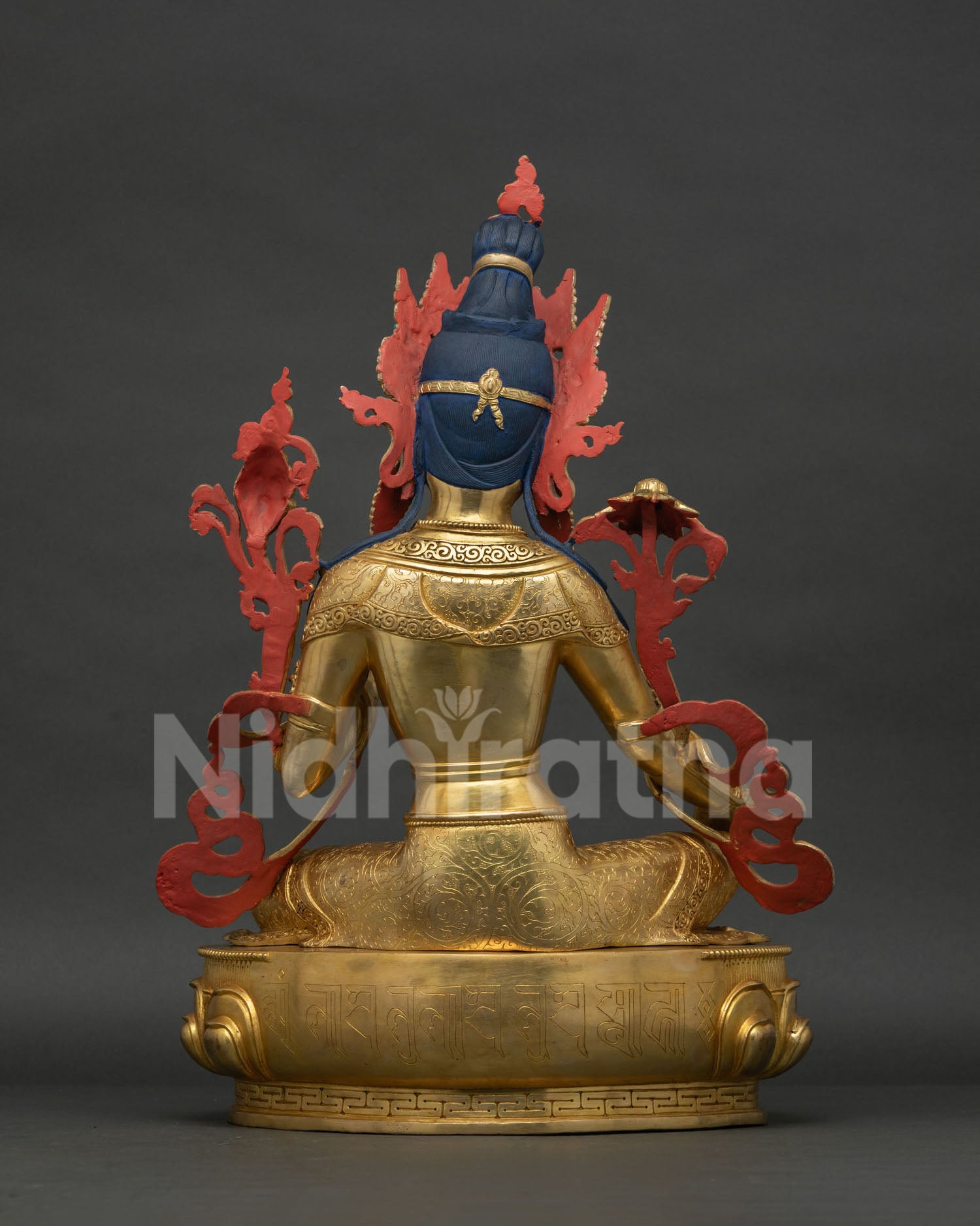 Back view of Green Tara Statue showing intricate crown and lotus pedestal detail