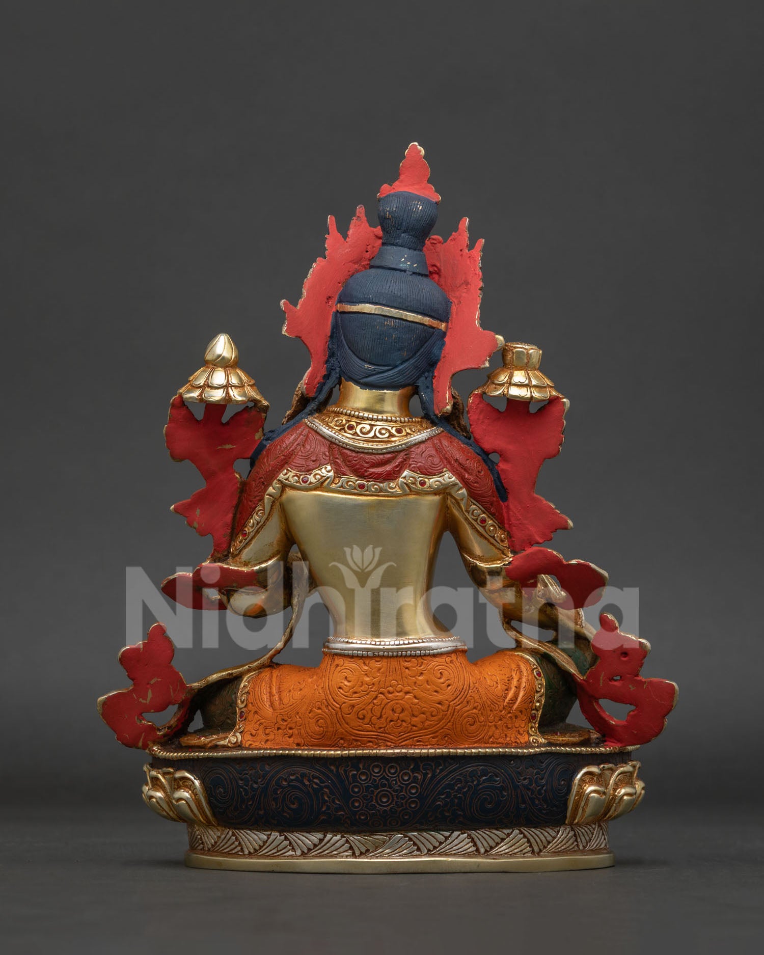 back view of green tara statue showing intricate handcrafted details
