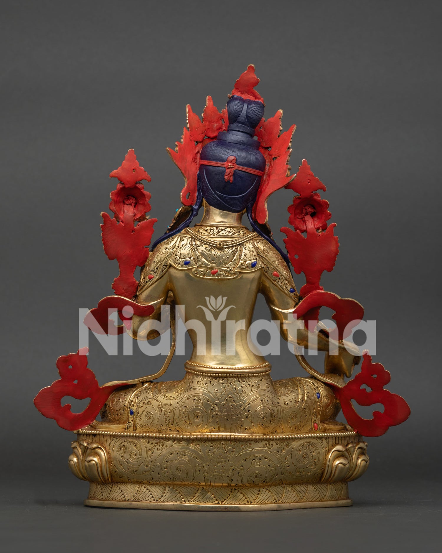Back view of Green Tara Statue with detailed copper carving and gold fire-gilding